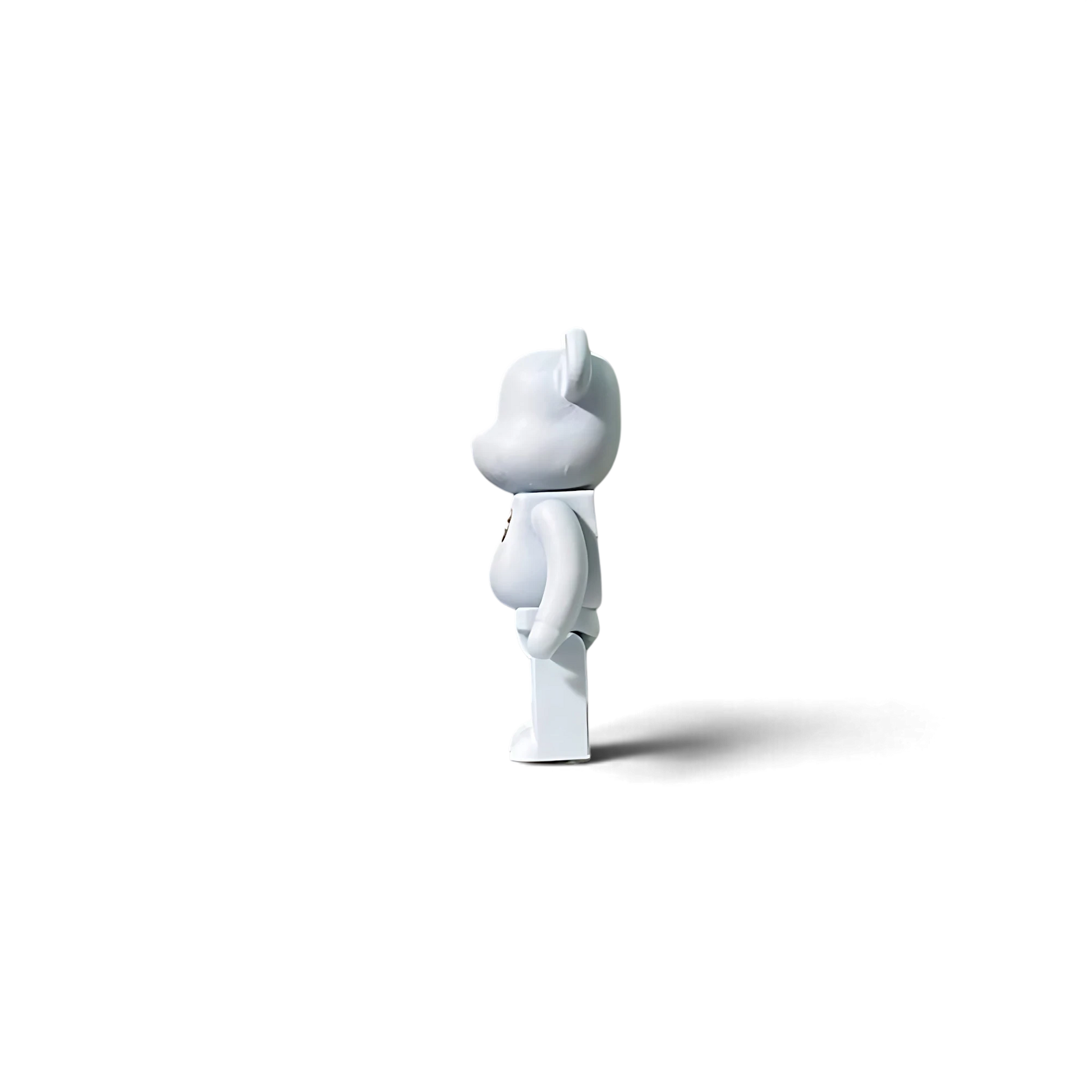 Lot57Supplies Diecast Shop 1:64 scale white resin Hype Bear diorama figure with a red chest logo, side view.