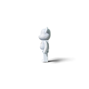 Lot57Supplies Diecast Shop 1:64 scale white resin Hype Bear diorama figure with a red chest logo, side view.