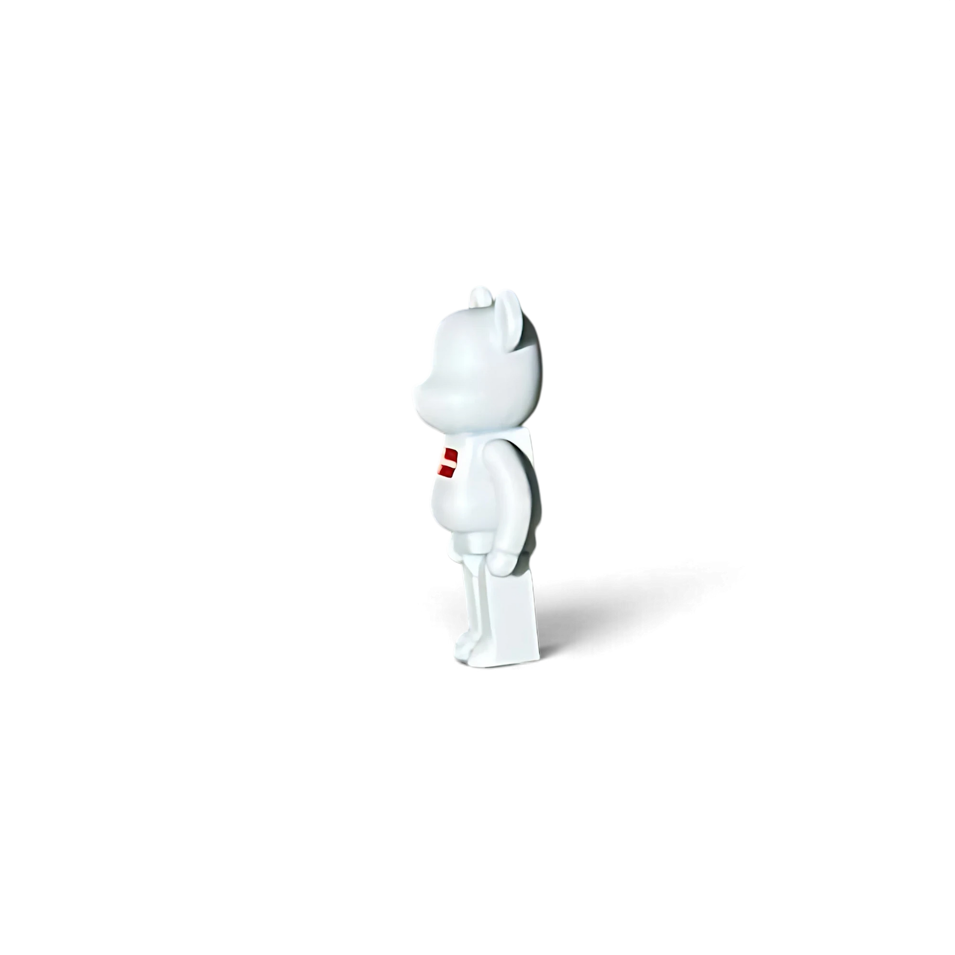 Lot57Supplies Diecast Shop 1:64 scale white resin Hype Bear diorama figure with red chest logo, side view