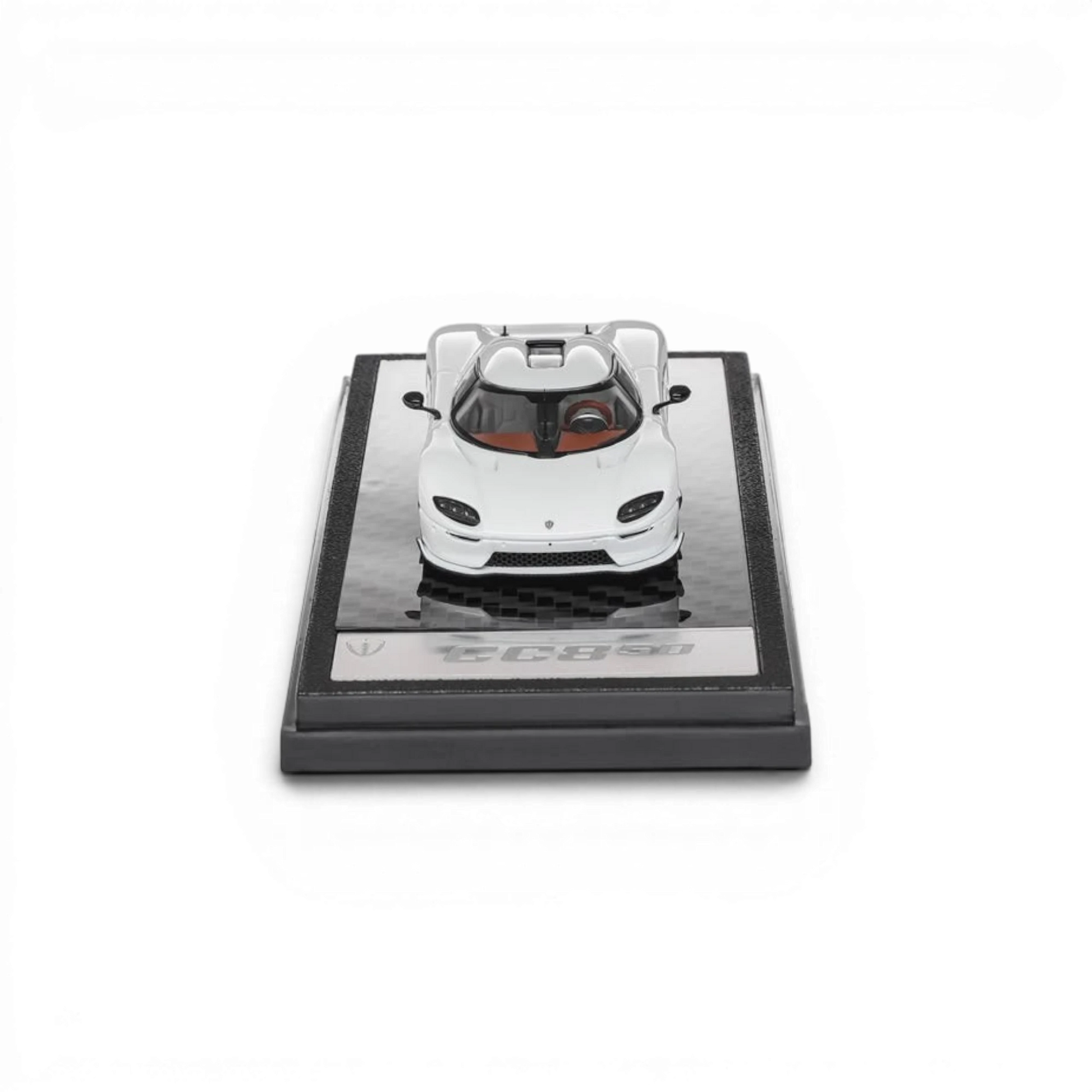 Lot57Supplies Diecast Shop 1:64 scale white LCD Koenigsegg CC850 diecast model car on a carbon fiber display base.
