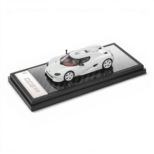 Lot57Supplies Diecast Shop 1:64 scale white LCD Koenigsegg CC850 diecast model car on a carbon fiber display base