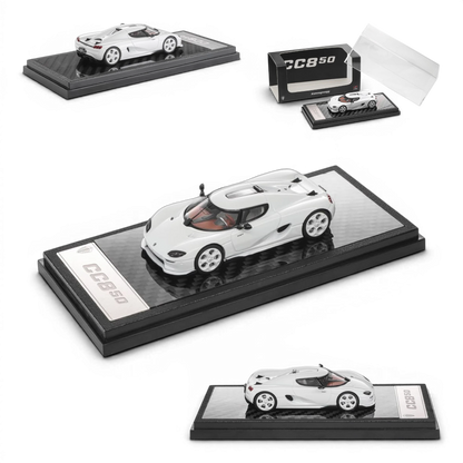 Lot57Supplies Diecast Shop 1:64 scale white LCD Koenigsegg CC850 diecast model car on a display base.
