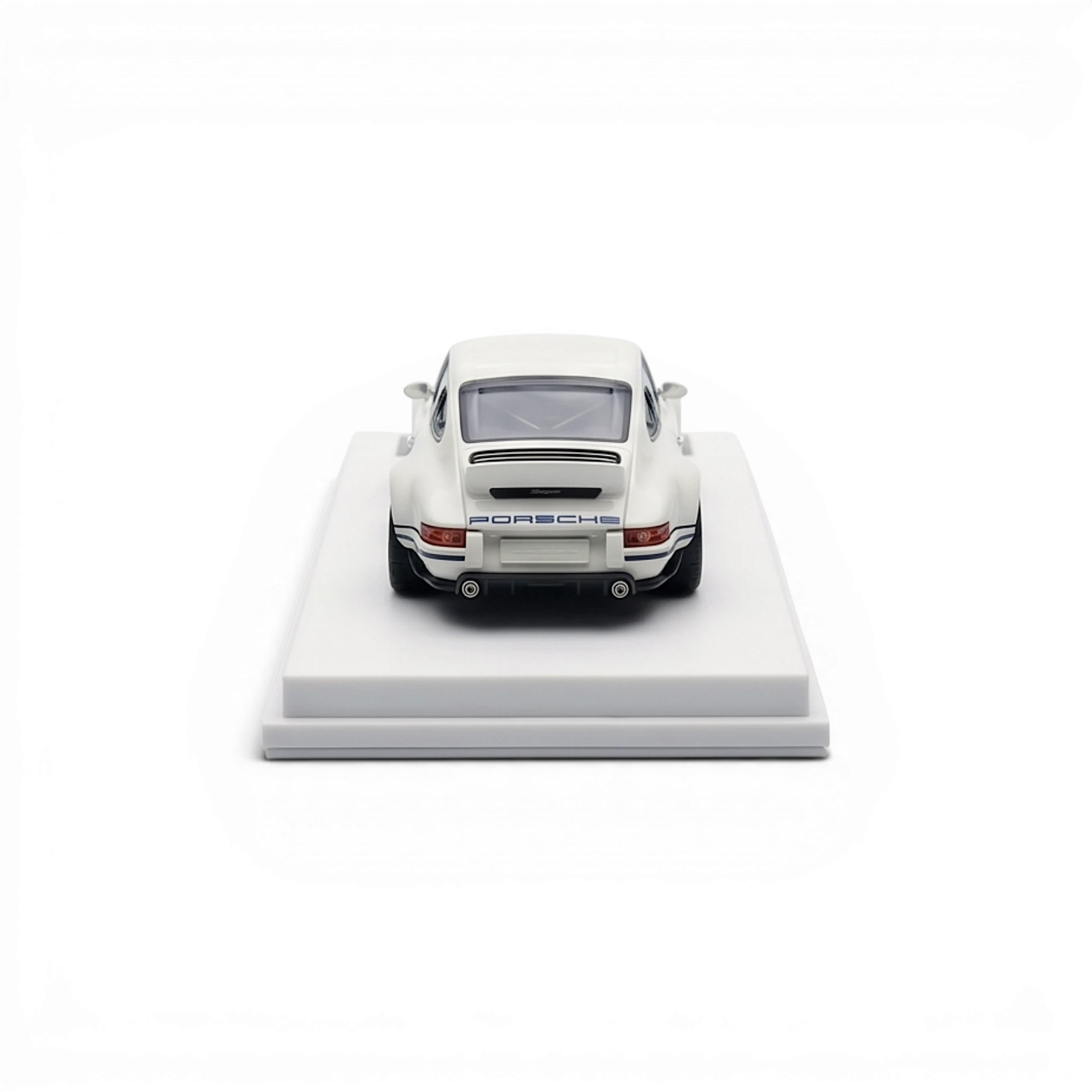 Lot57Supplies Diecast Shop white dark blue DeepMaker Singer DLS 1:64 scale resin model car on display base.
