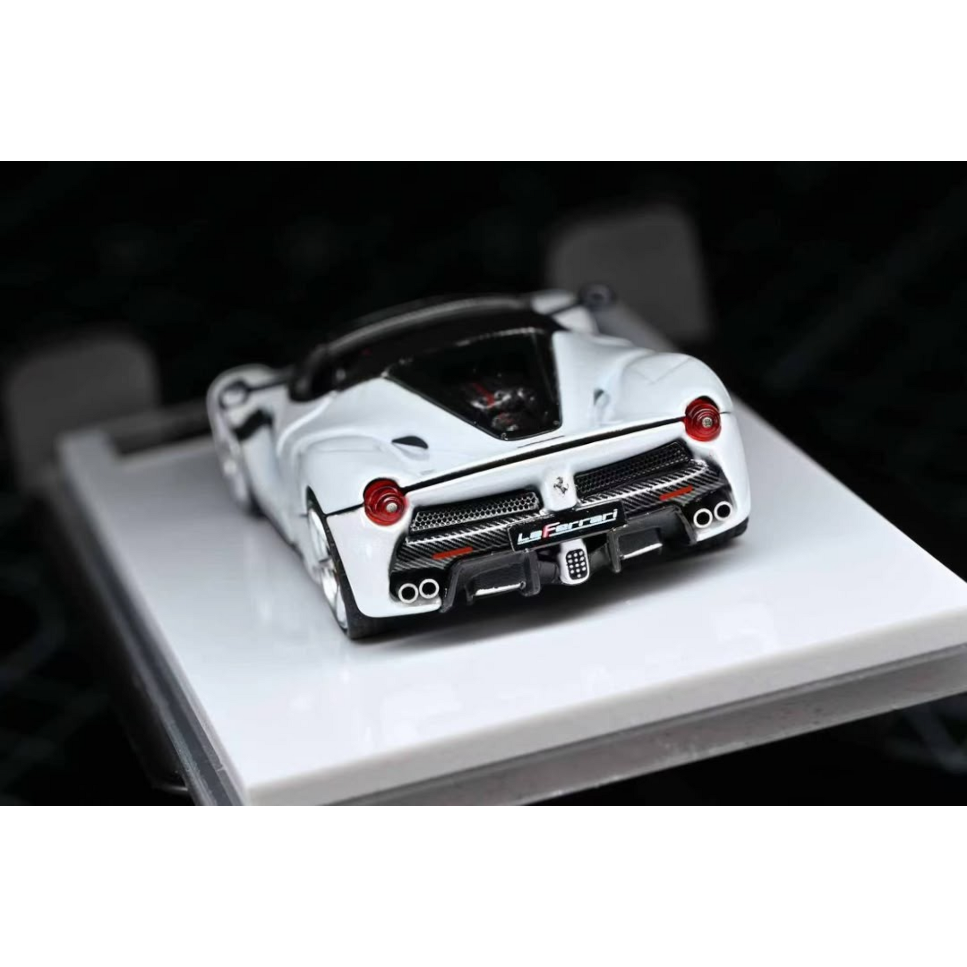 Lot57Supplies Diecast Shop 1:64 scale white Street Buster F150 Aperta diecast supercar model, rear view