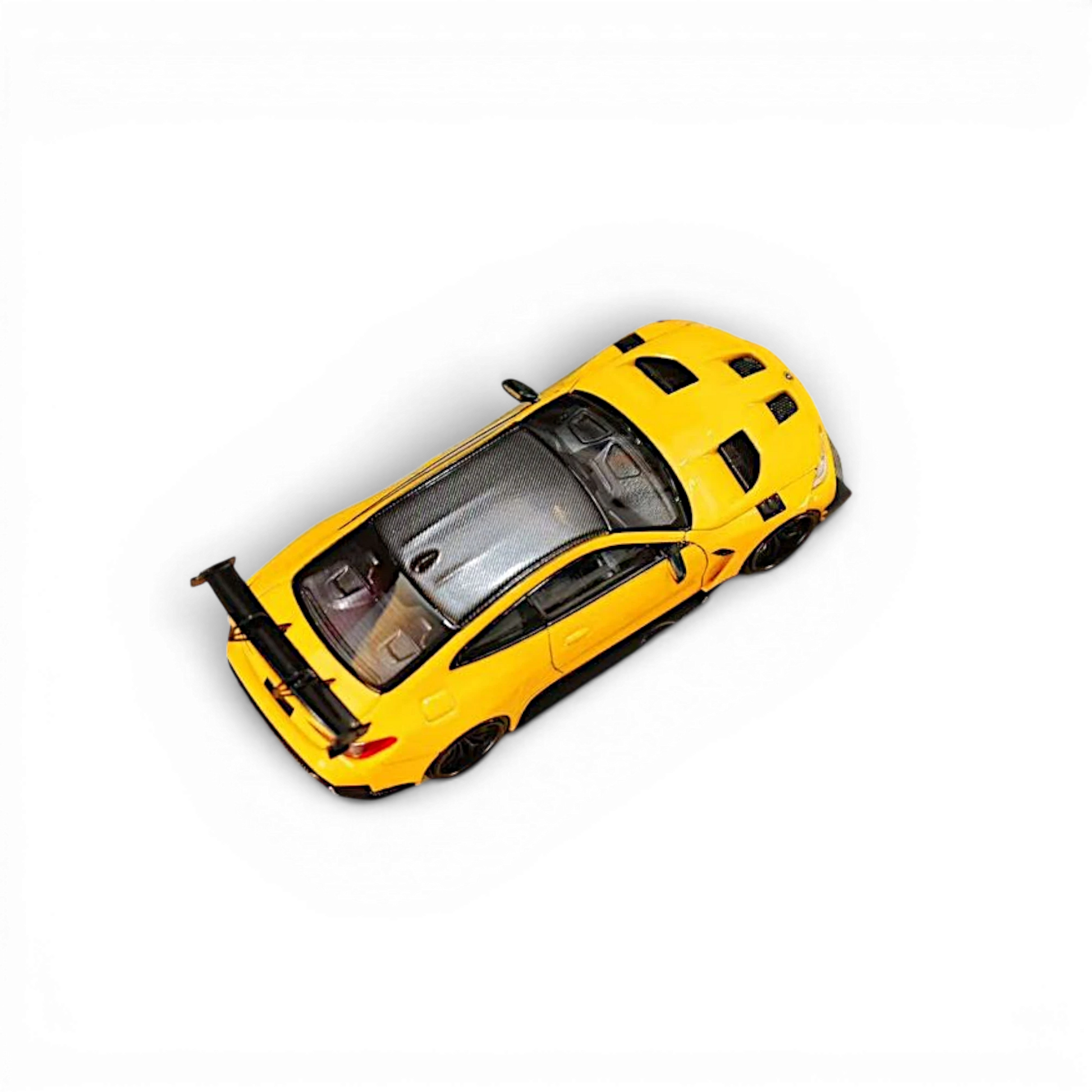 Lot57Supplies Diecast Shop 1:64 scale yellow SW BMW M4 Flossmann G82 GTR diecast model car with carbon fiber roof