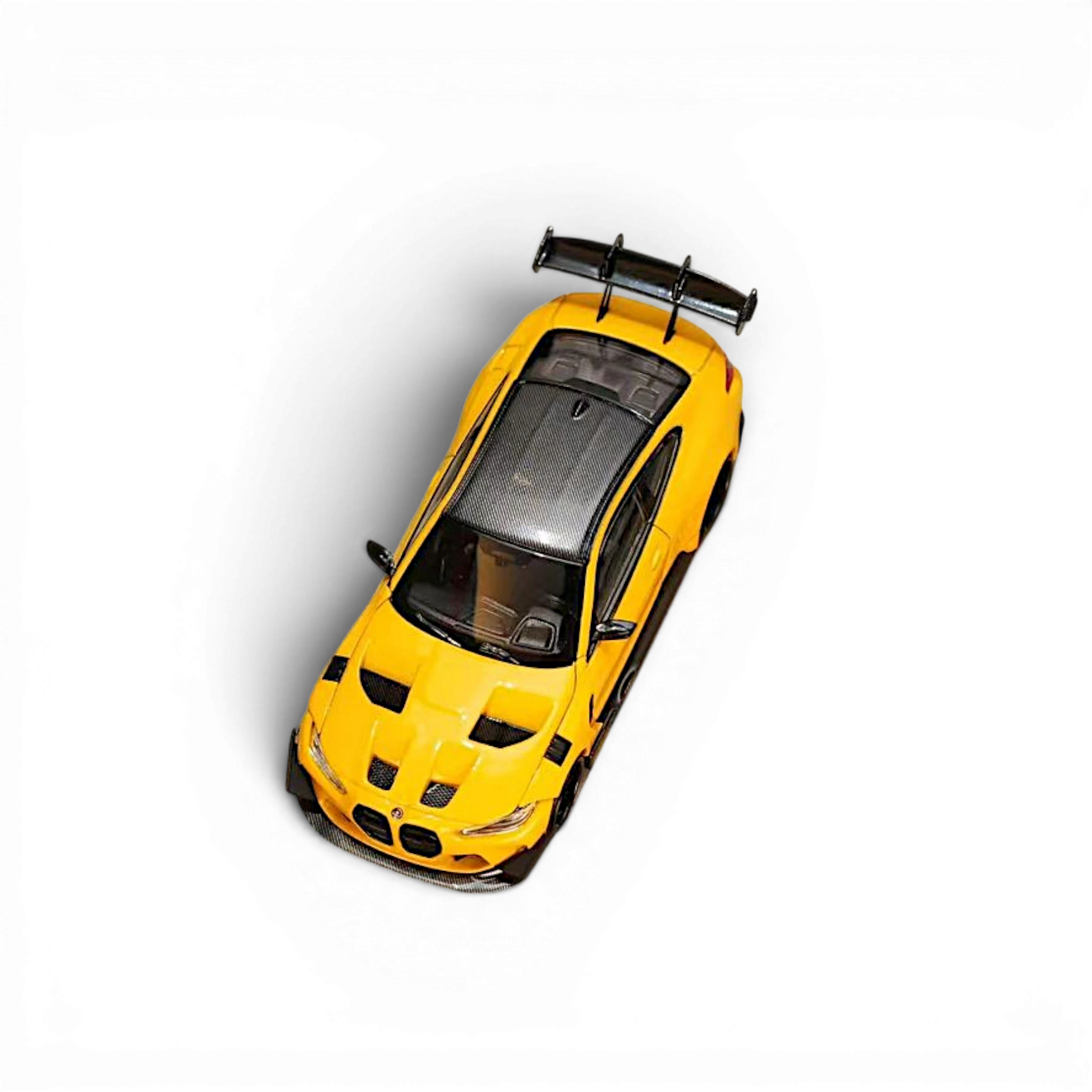 Lot57Supplies Diecast Shop yellow SW BMW M4 Flossmann G82 GTR diecast model car with carbon fiber roof, top view
