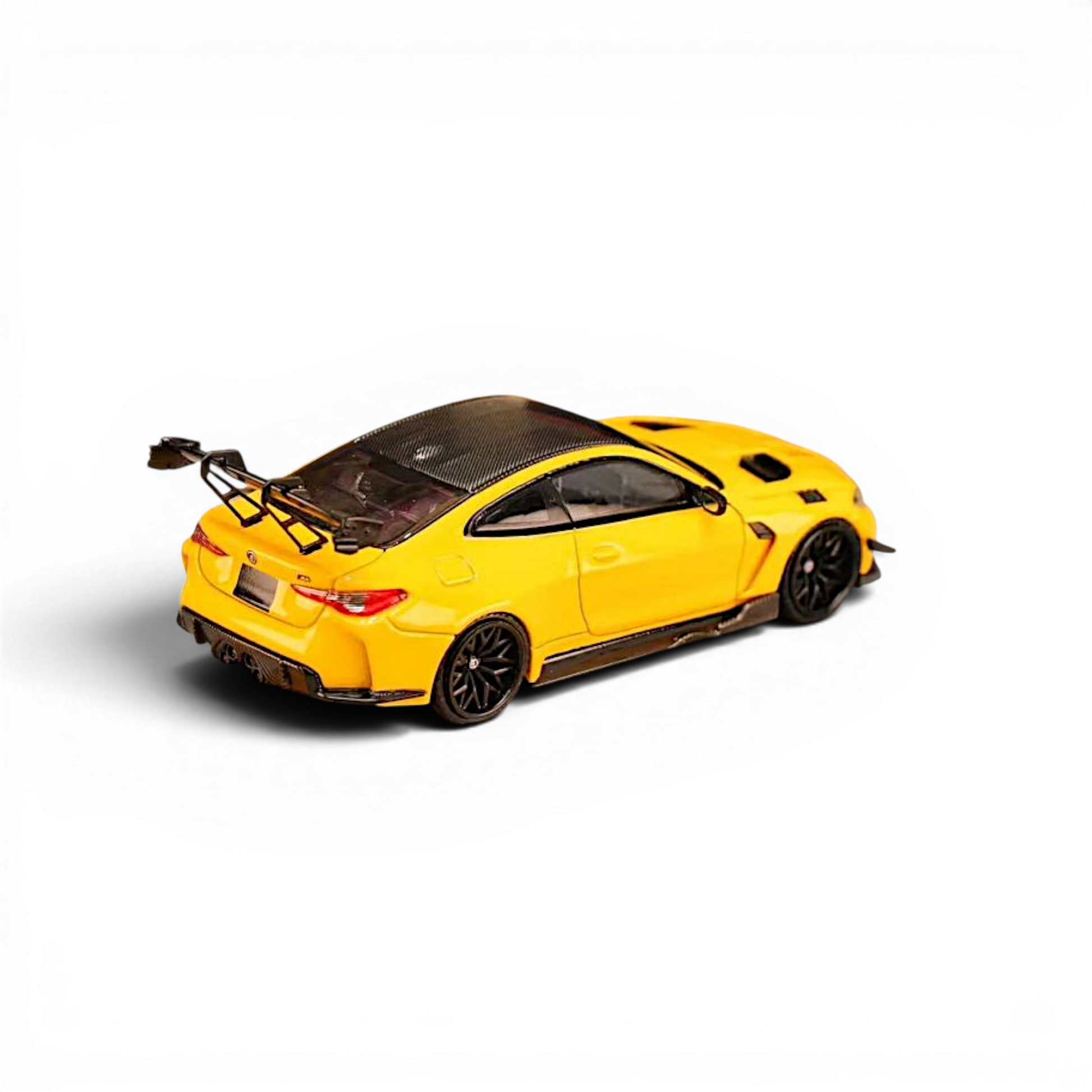 Lot57Supplies Diecast Shop yellow SW BMW M4 Flossmann G82 GTR 1:64 scale diecast model car with rear wing
