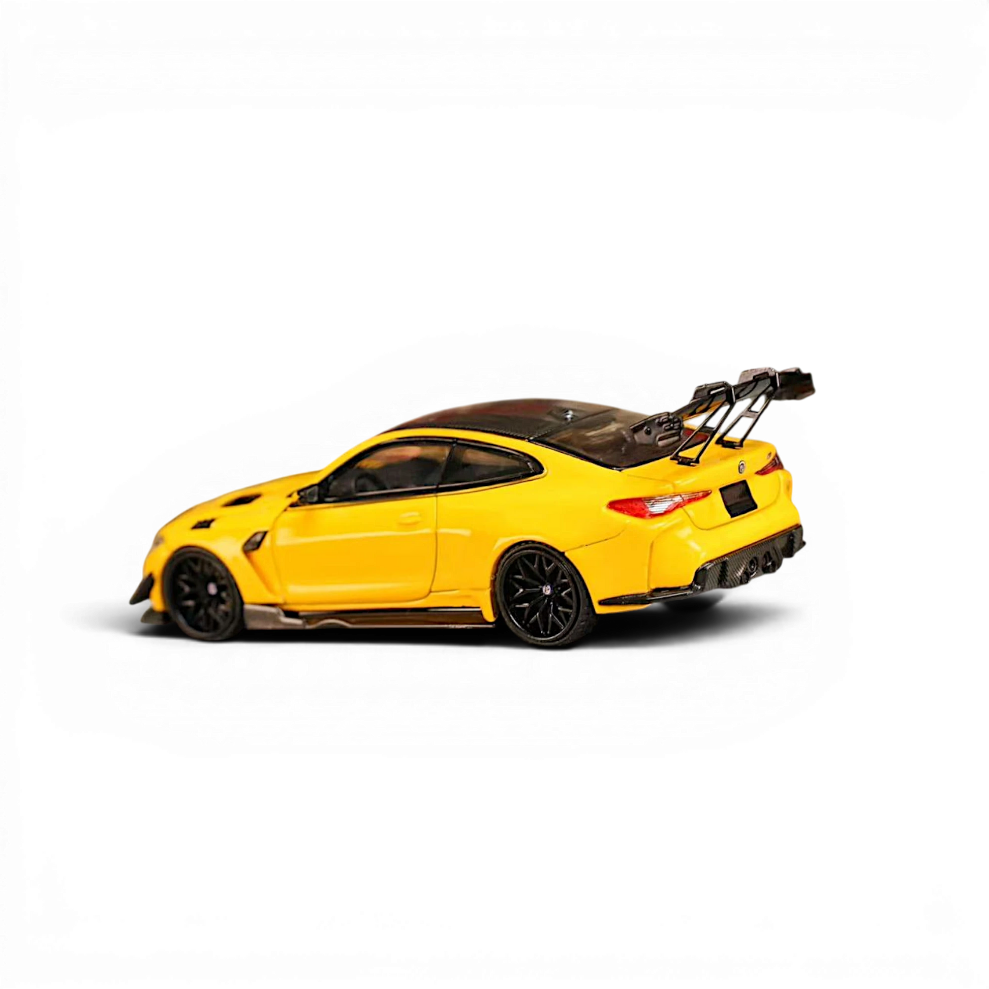 Lot57Supplies Diecast Shop 1:64 scale yellow SW BMW M4 Flossmann G82 GTR diecast model car with rear wing