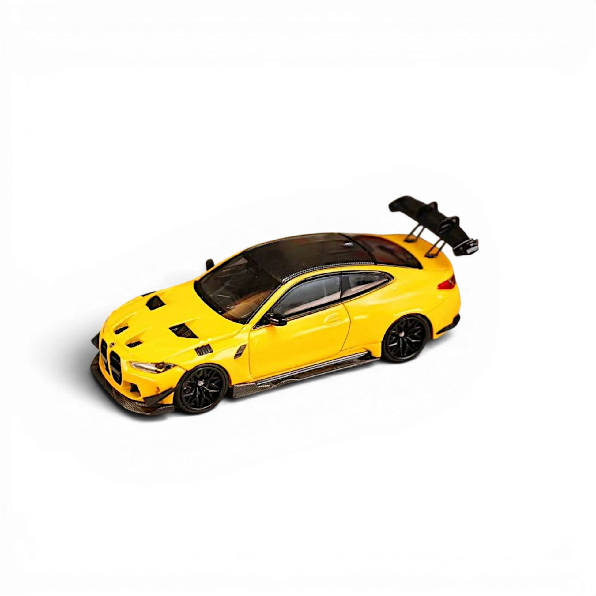 Lot57Supplies Diecast Shop 1:64 scale yellow BMW M4 Flossmann G82 GTR diecast model car with carbon fiber details.