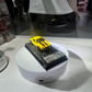 Lot57Supplies Diecast Shop bliss 1:64 scale yellow 1978 Camaro Bumblebee diecast car on a display stand