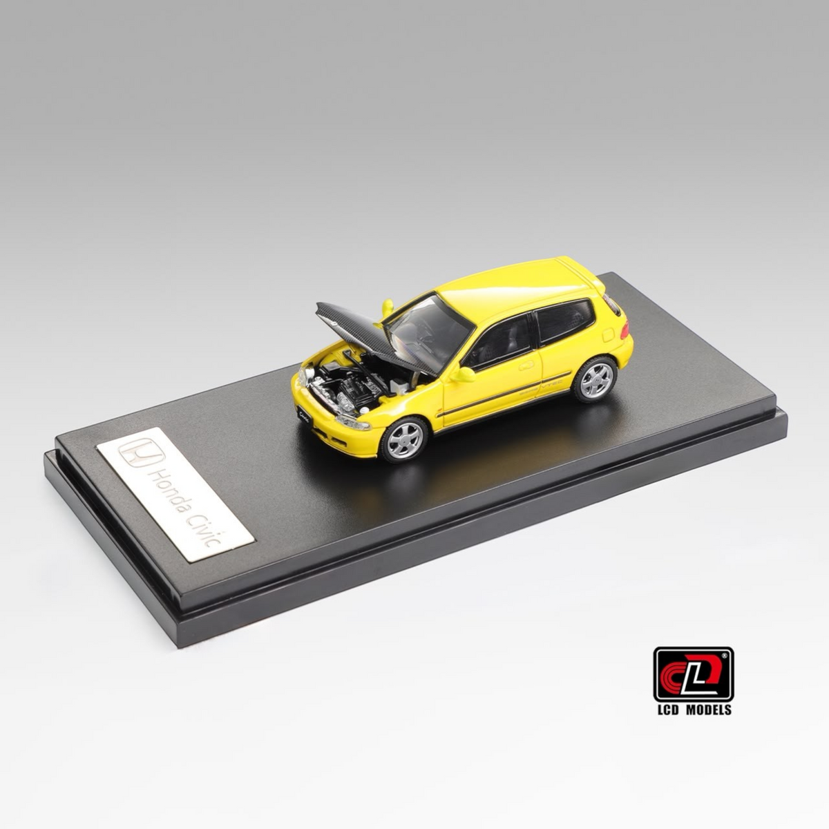 Lot57Supplies Diecast Shop 1:64 scale yellow Honda Civic SiR II EG6 diecast model with open hood and carbon fiber cover