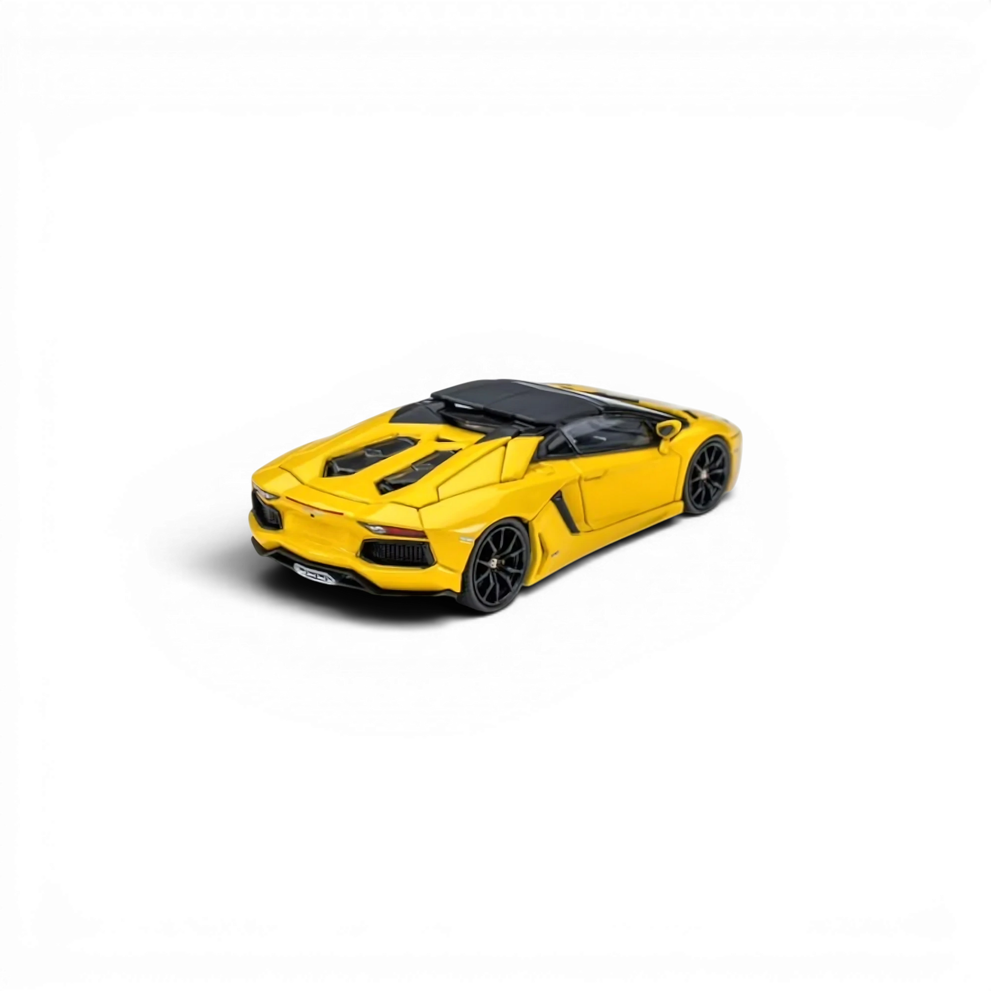 Lot57Supplies Diecast Shop CLASSIC GARAGE 1:64 scale LP700 Roadster diecast model car in May Yellow with black wheels.