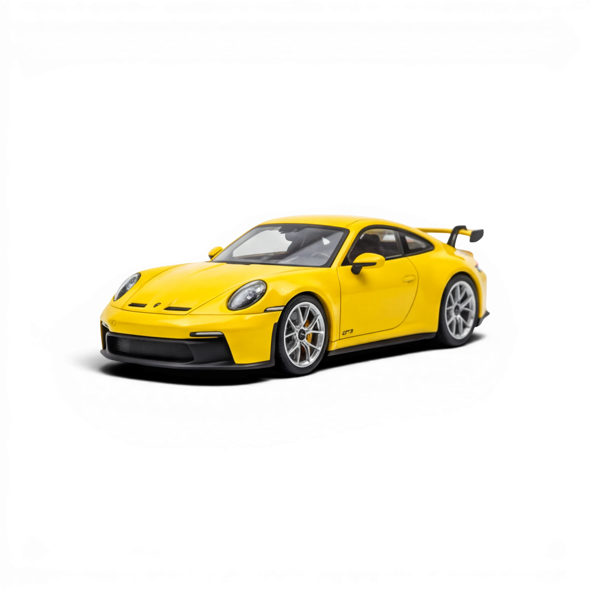 Lot57Supplies Diecast Shop yellow 1:64 scale resin Porsche 911 GT3 model with silver wheels and black accents.