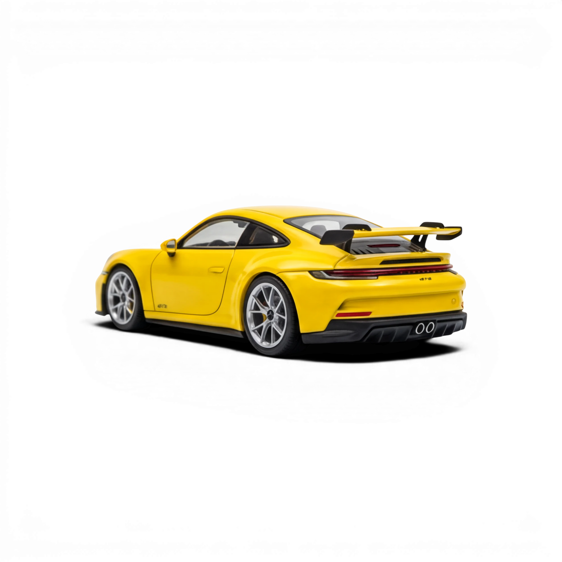 Lot57Supplies Diecast Shop yellow 1:64 scale resin Porsche 911 GT3 model with large rear spoiler and silver wheels.