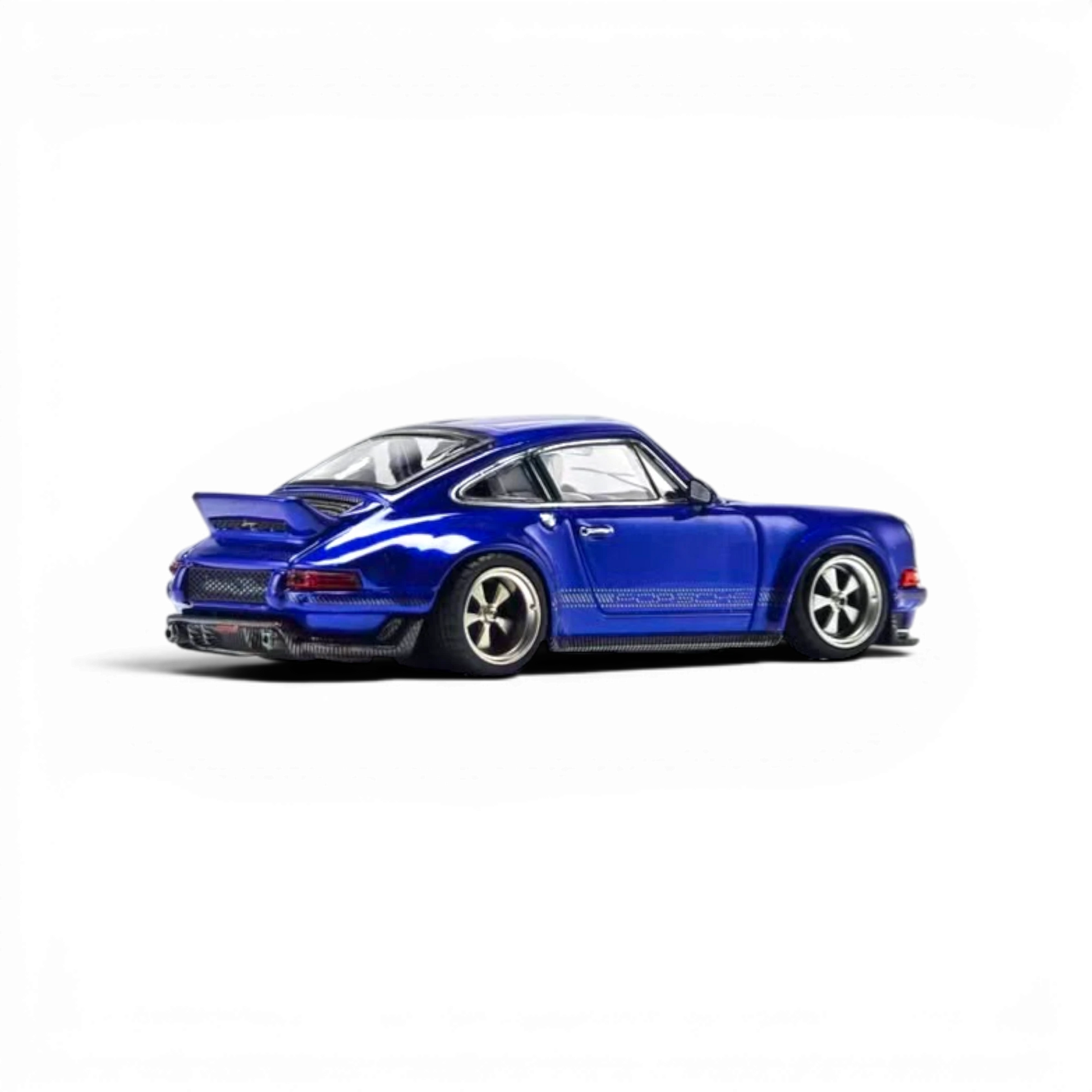 Lot57Supplies Diecast Shop Zincit 1:64 scale Singer DLS diecast model car in metallic sapphire blue with rear spoiler.