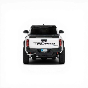 Lot57Supplies Diecast Shop: White 1:64 scale 4th Gen Toyota Tacoma TRD PRO diecast model with black accents and TRD PRO tailgate lettering.
