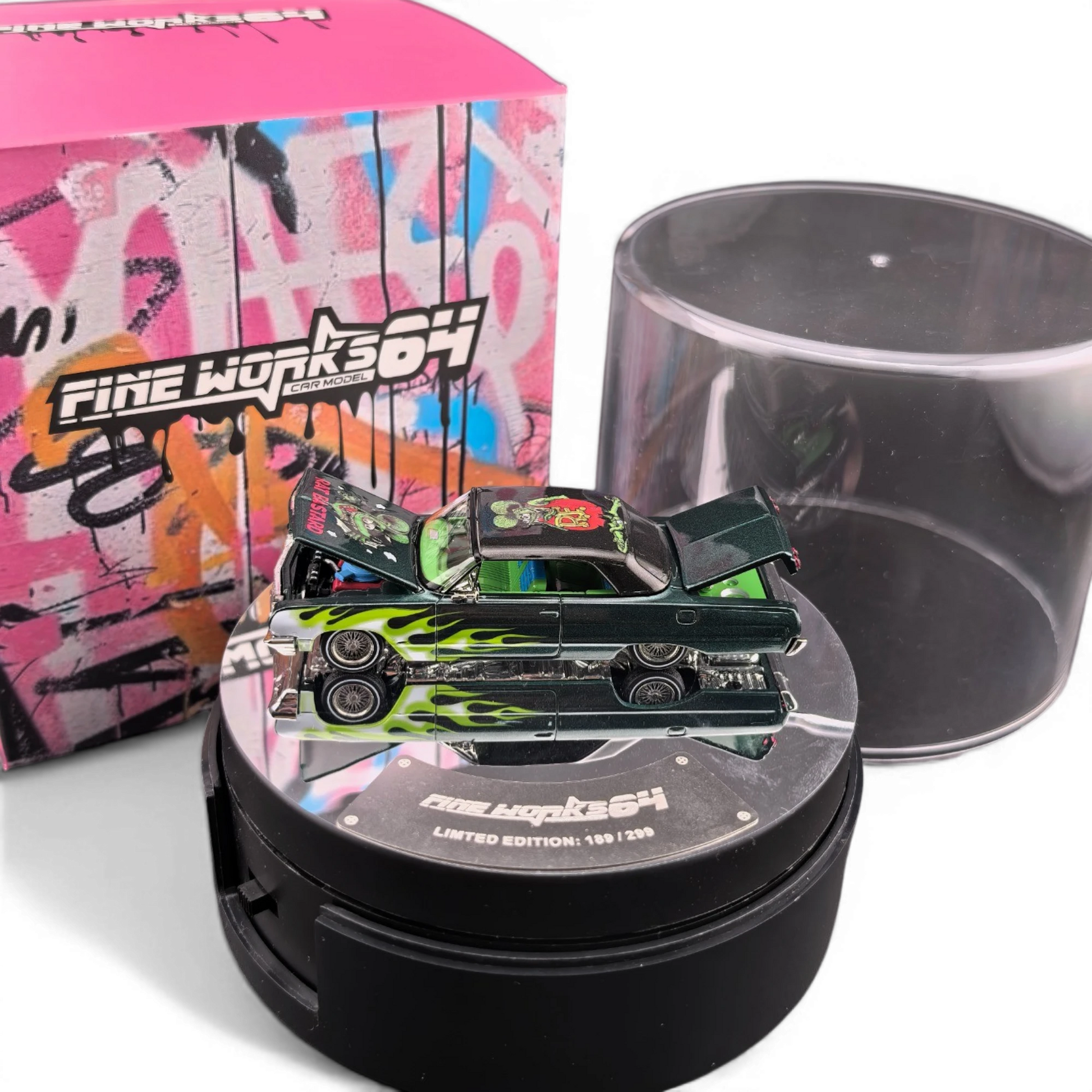 Lot57Supplies Diecast Shop: Emerald green 1:64 scale Chevrolet Impala with flame graphics, opening hood and trunk.