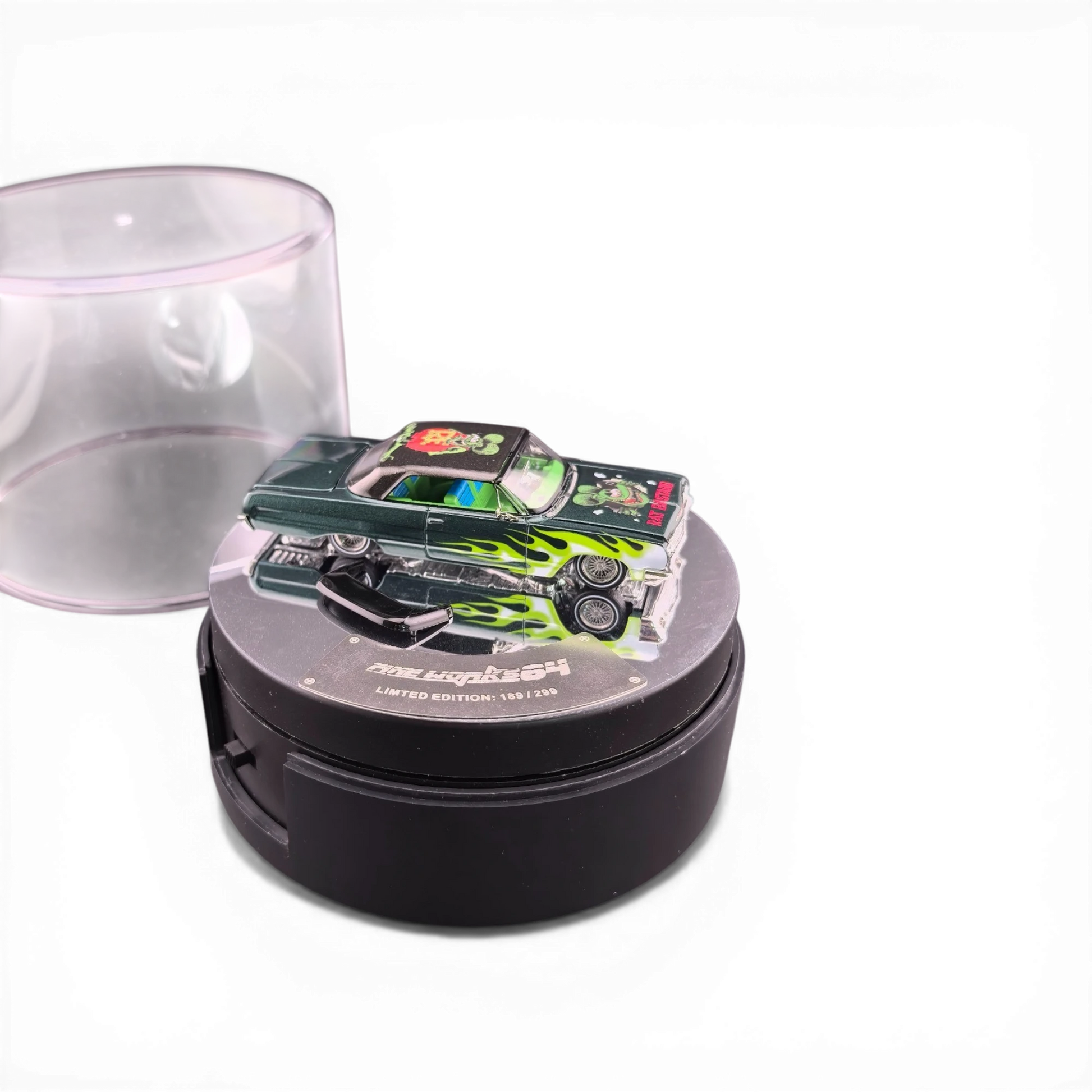 Lot57Supplies Diecast Shop: 1:64 scale emerald green diecast Chevrolet Impala West Coast Bouncing Car with Fink Mouse graphics and flames.