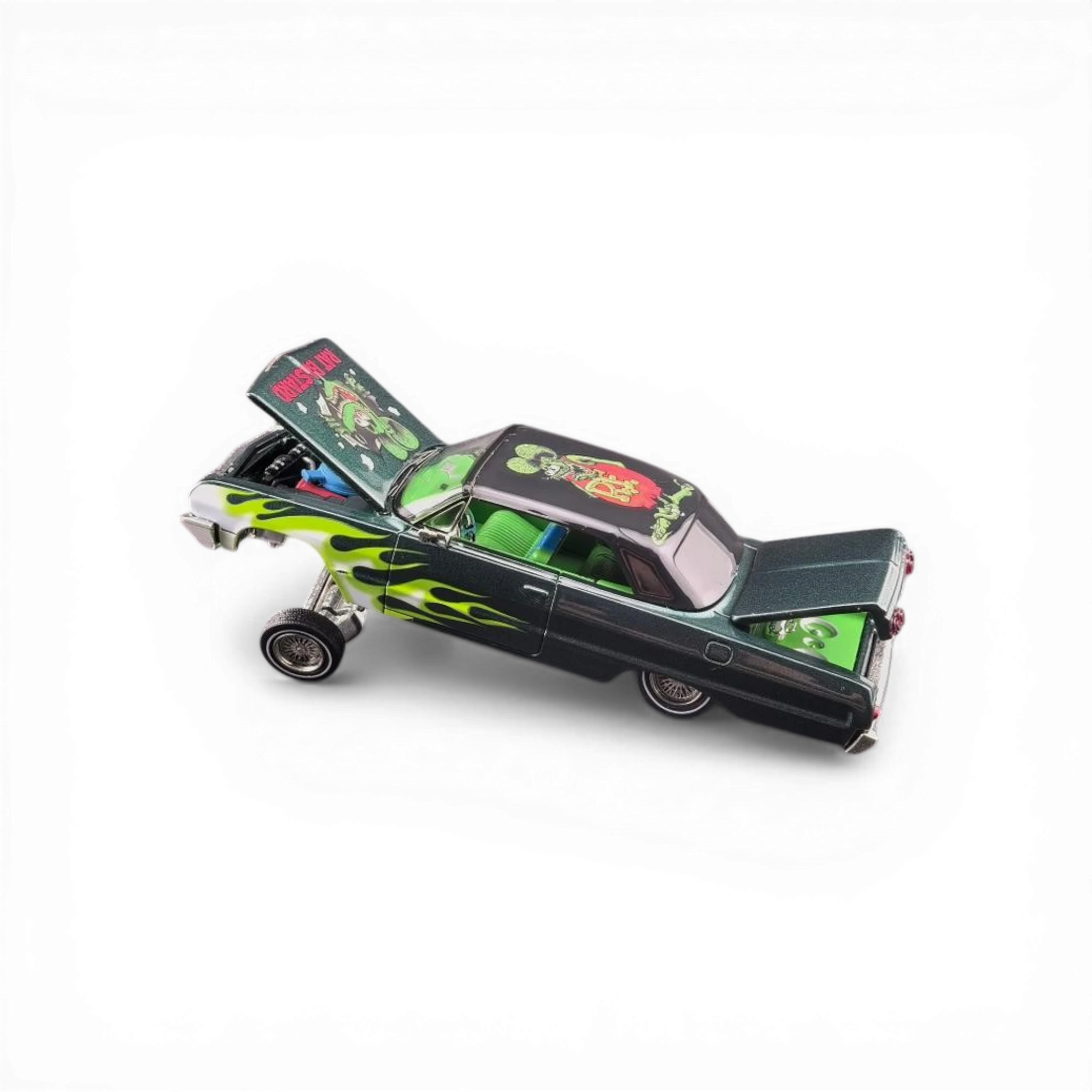 Lot57Supplies Diecast Shop 1:64 scale emerald green 1964 Chevrolet Impala lowrider with flames and Fink Mouse graphics.
