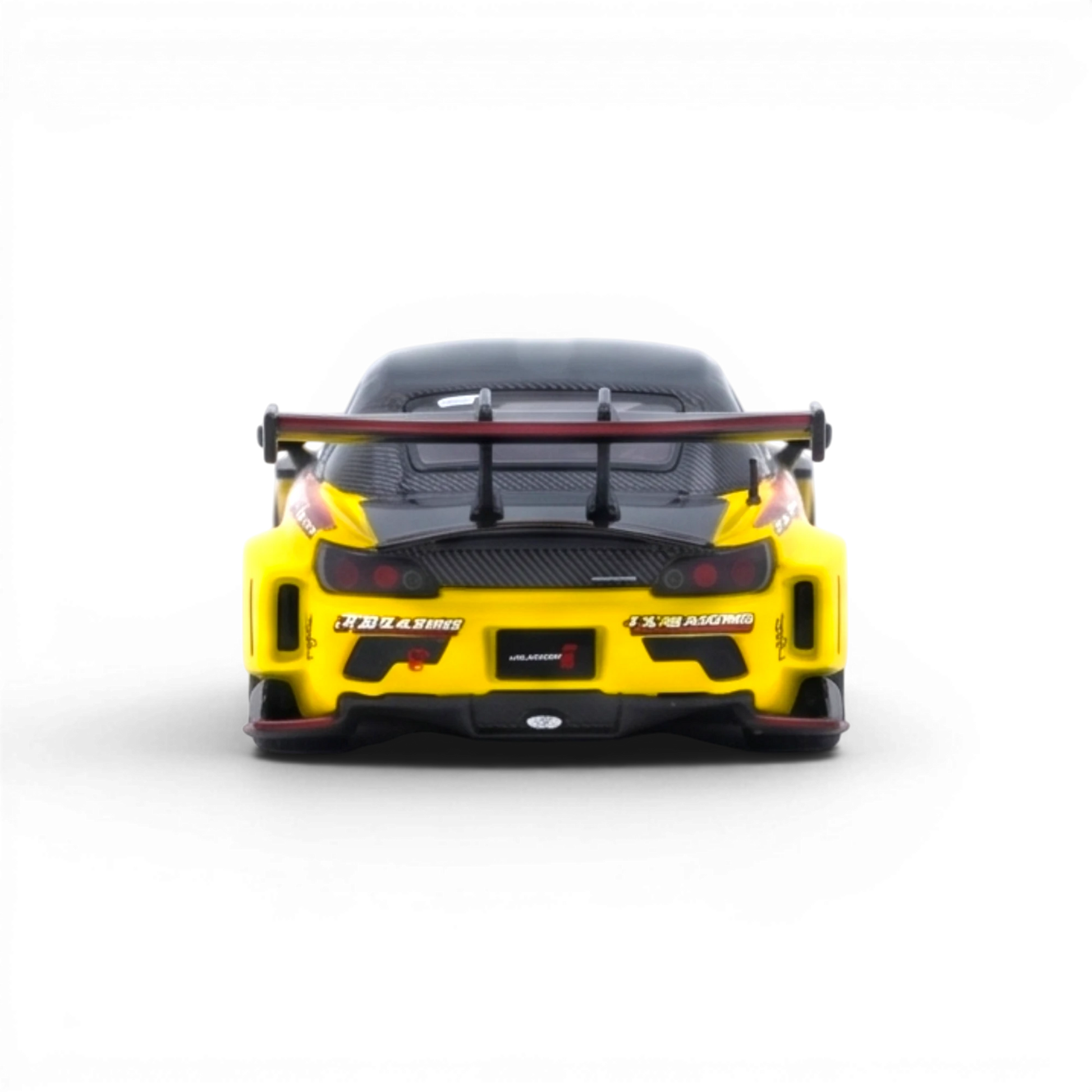 Lot57Supplies Diecast Shop yellow Honda S2000 J's Racing AP1 1:64 scale model with large rear spoiler and detailed decals.