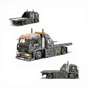 Lot57Supplies Diecast Shop: SW KamaZ tow truck, 1:64 scale, diecast, grey camouflage livery, Monster Energy graphics, flatbed.