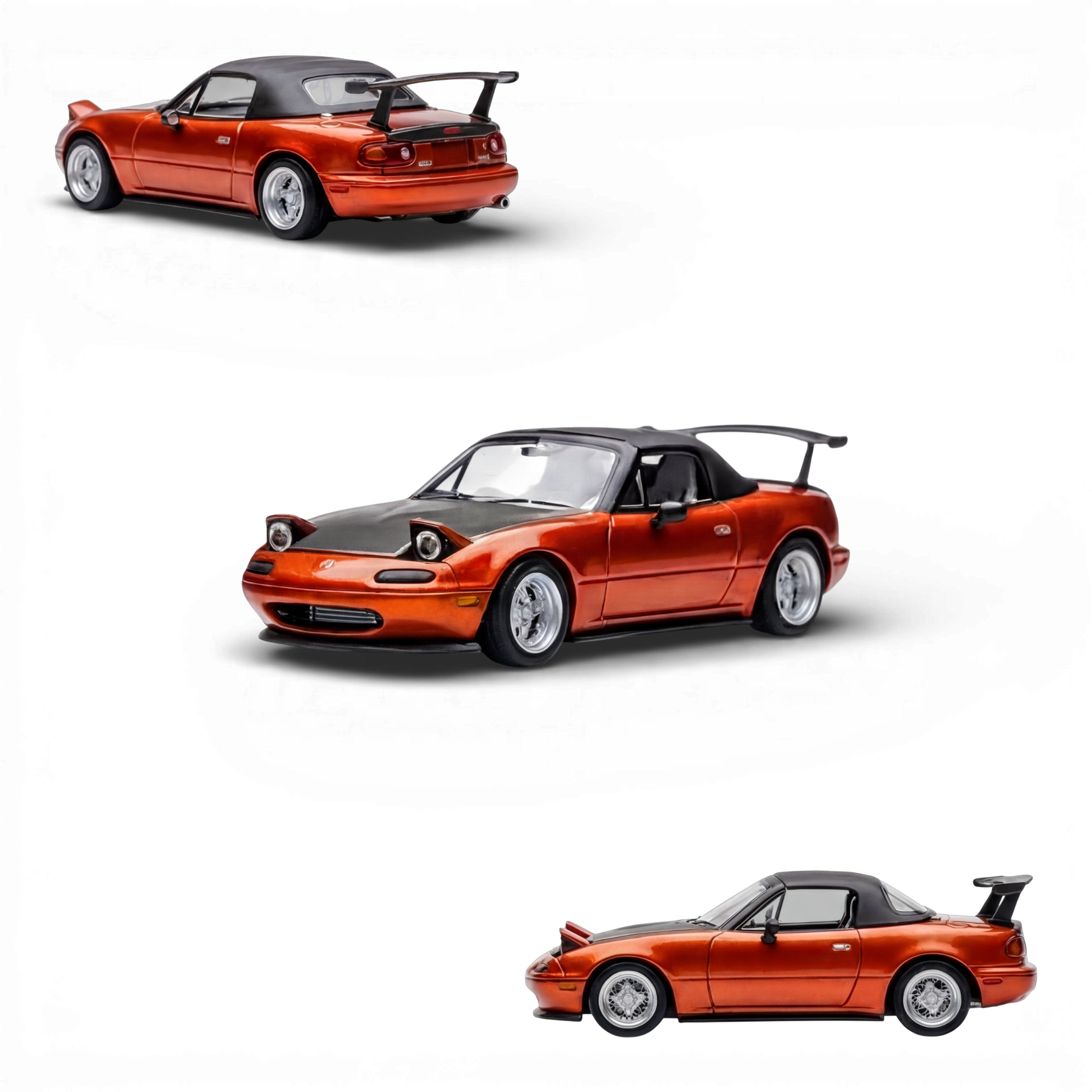 Lot57Supplies diecast model of a red Mazda Miata MX-5 with pop-up headlights and a black spoiler. 1:64 scale.