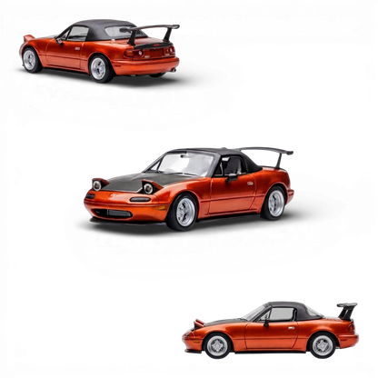 Lot57Supplies diecast model of a red Mazda Miata MX-5 with pop-up headlights and a black spoiler. 1:64 scale.