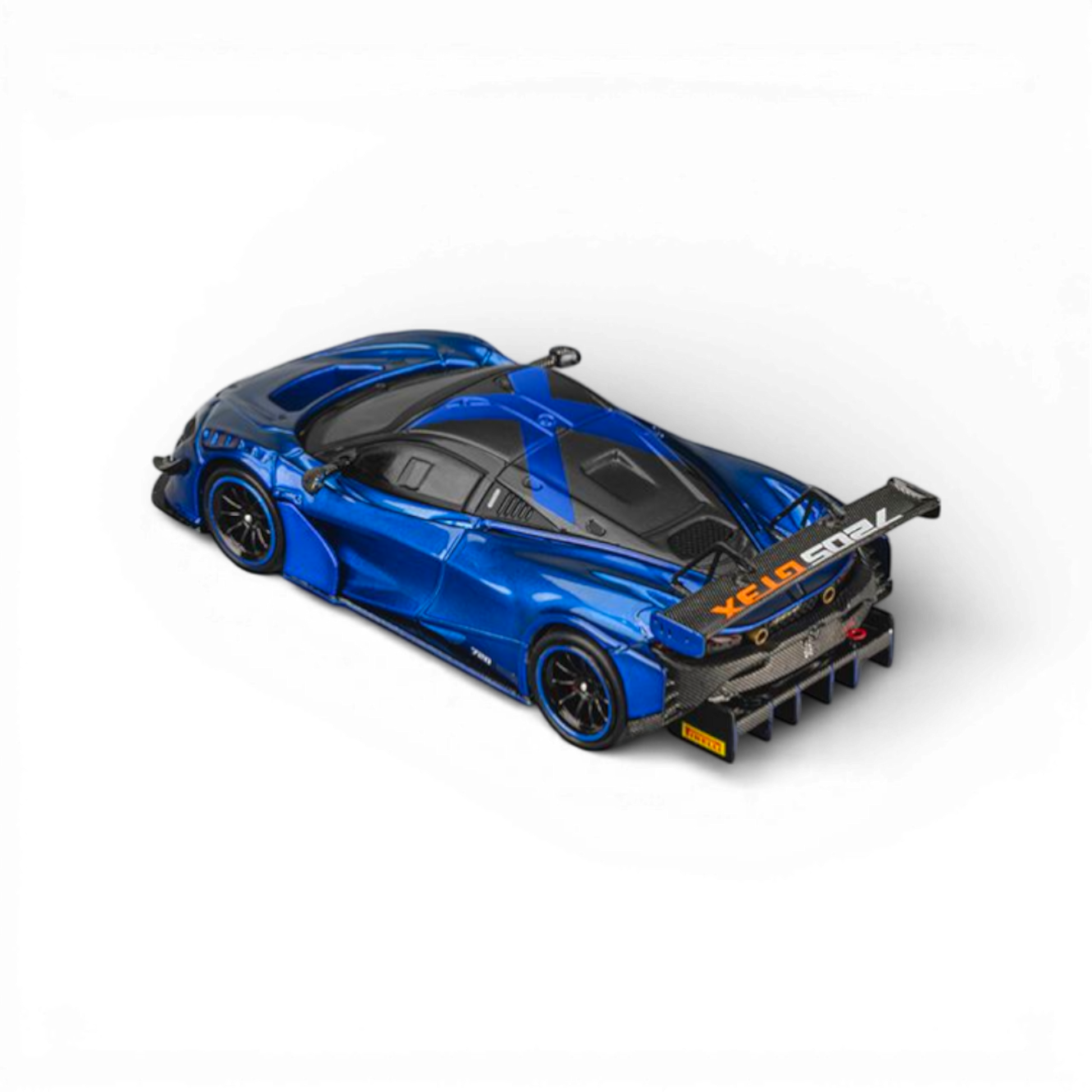 Lot57Supplies Diecast Shop 1:64 scale Aurora Blue McLaren 720S GT3X diecast model with large rear wing and carbon fiber details.