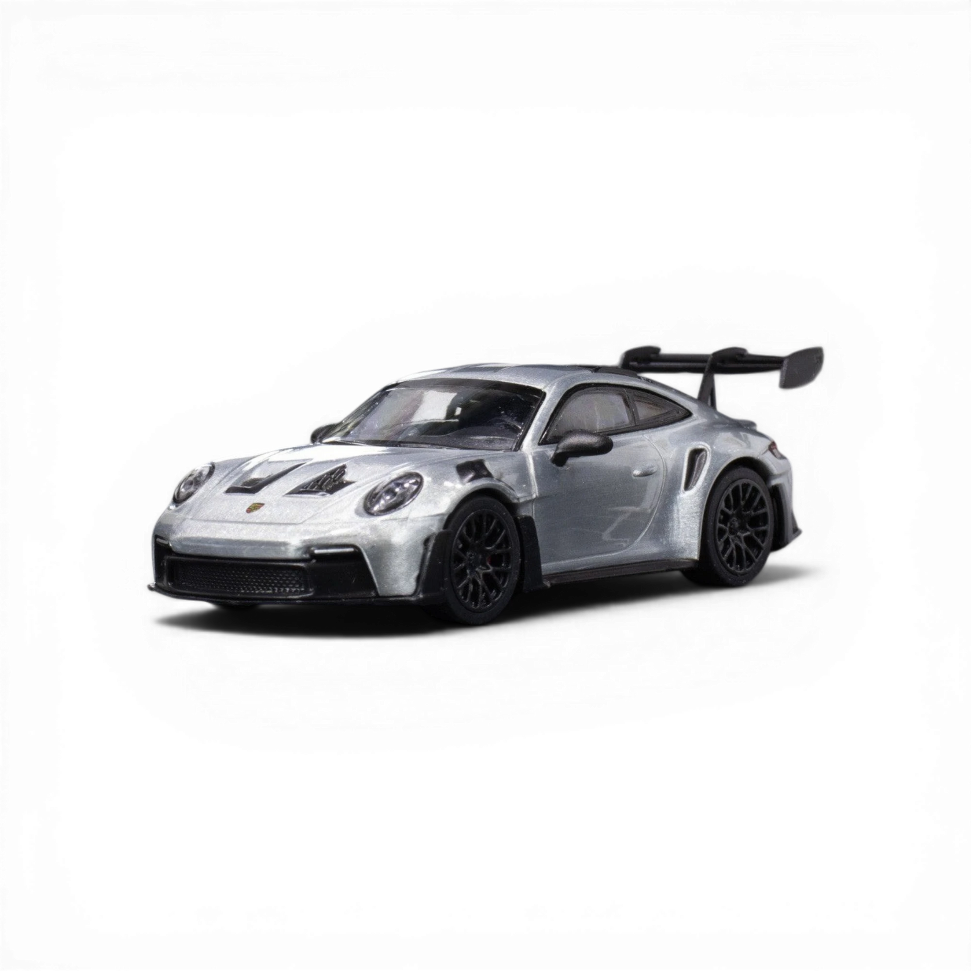 Lot57Supplies Diecast Shop Minichamps Porsche 911 GT3 RS raw silver 1:64 scale diecast model car with large rear spoiler.