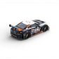 Lot57Supplies Diecast Shop: Black 1:64 scale Inno64 Nissan GT-R R35 LB Silhouette Aorus diecast model with orange and white accents, featuring anime livery and gold wheels.