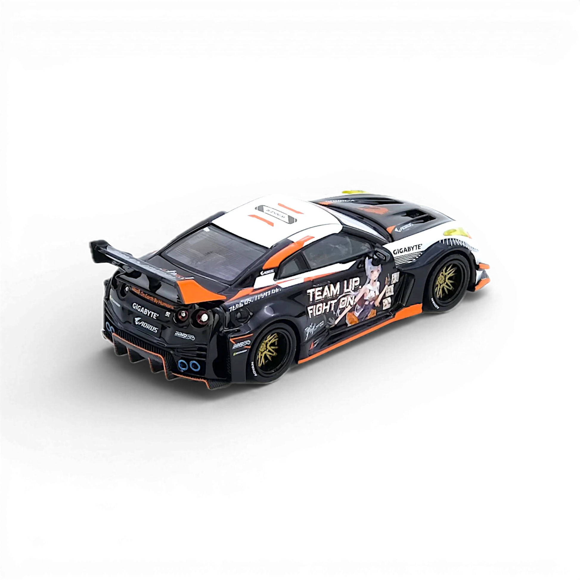 Lot57Supplies Diecast Shop: Black 1:64 scale Inno64 Nissan GT-R R35 LB Silhouette Aorus diecast model with orange and white accents, featuring anime livery and gold wheels.