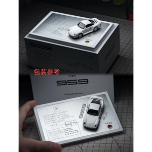 Lot57Supplies Diecast Shop 1:64 scale white Petrolab x EDM Porsche 959 with dark blue stripes on display base.