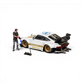 Lot57Supplies Diecast Shop 1:64 scale white Porsche RWB 930 with gold rims, black GT wing, and NFS livery. Includes figure.