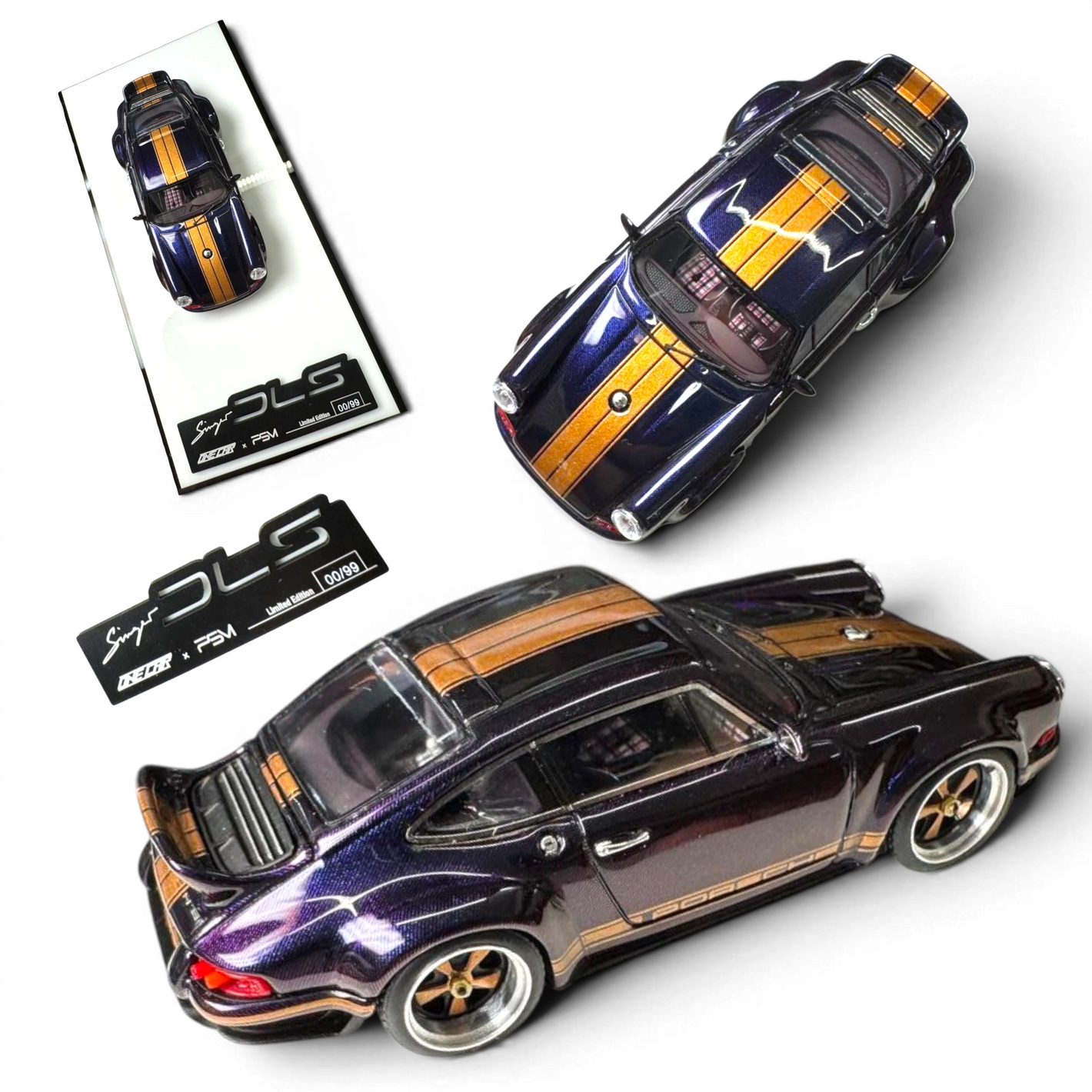 Lot57Supplies Diecast Shop 1:64 scale dark blue resin Porsche Singer DLS model car with gold stripes and a rear spoiler.