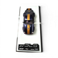 Lot57Supplies Diecast Shop PSM Porsche Singer DLS 1:64 scale model, dark blue with gold racing stripes and roof rack.