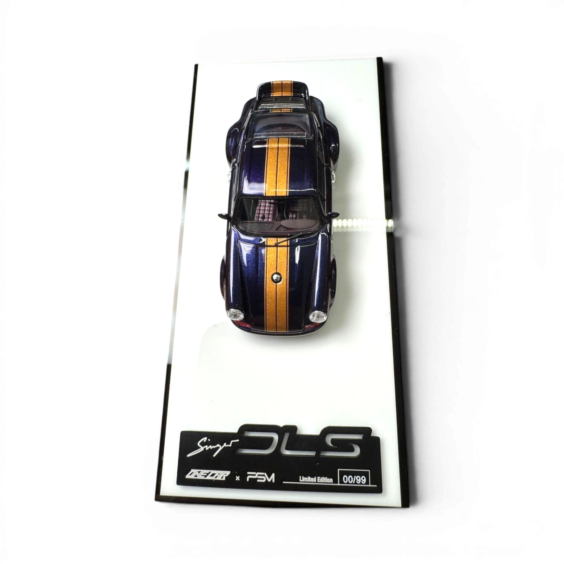 Lot57Supplies Diecast Shop PSM Porsche Singer DLS 1:64 scale model, dark blue with gold racing stripes and roof rack.