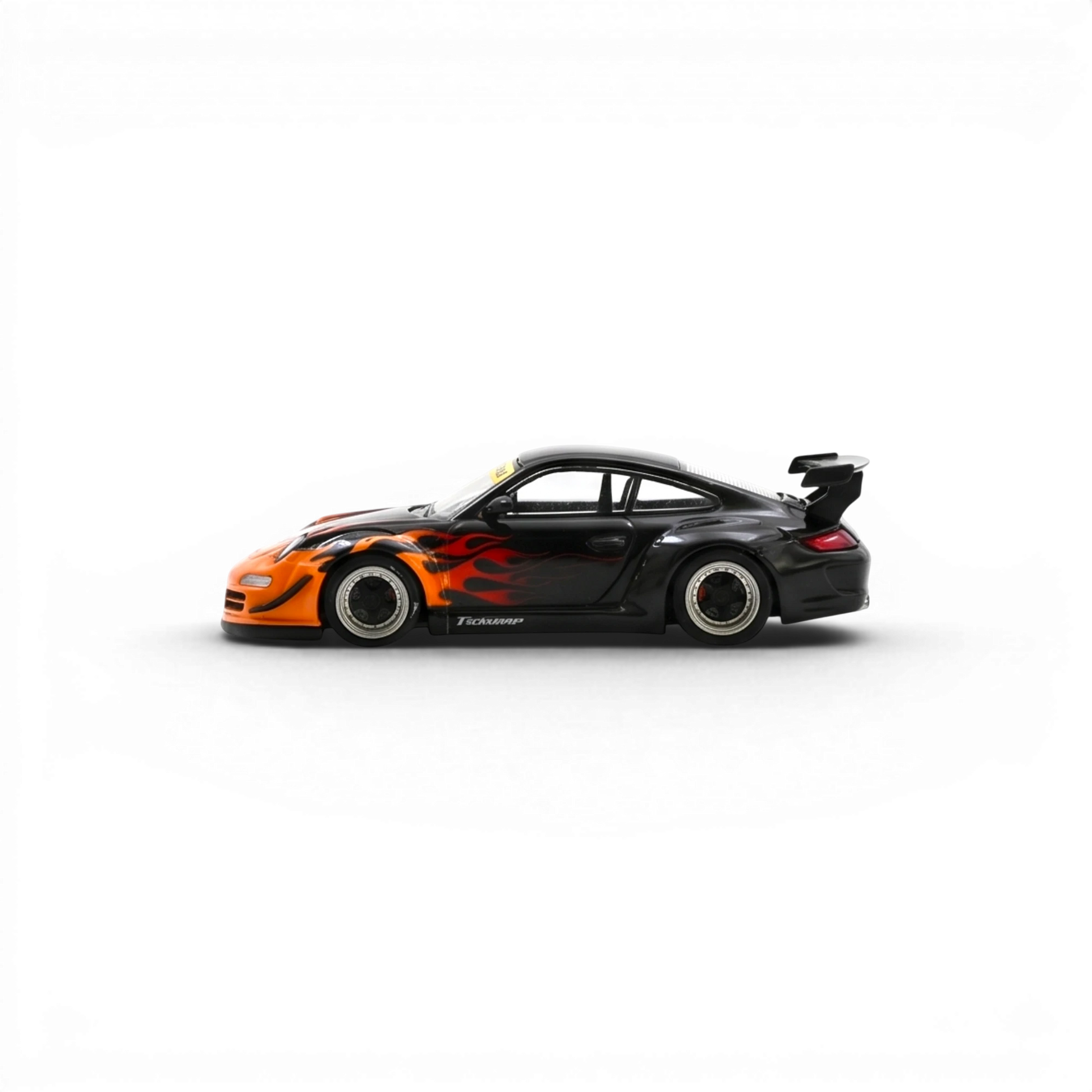 Lot57Supplies Diecast Shop 1:64 scale black Porsche RWB 997 with orange burning flame livery and widebody kit.