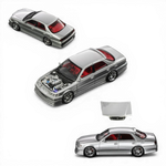 Lot57Supplies Diecast Shop silver 1:64 scale diecast model car with red interior and detailed engine.