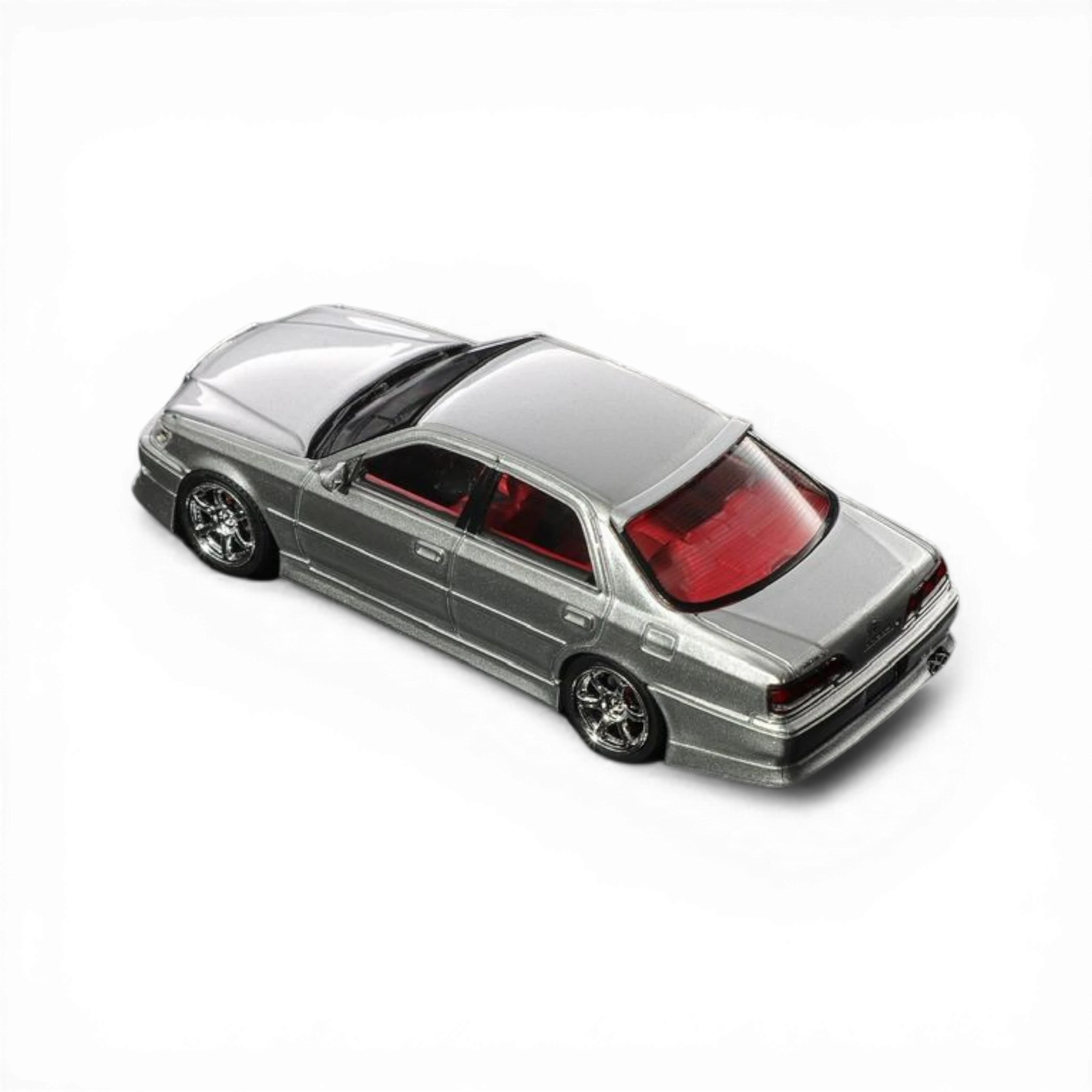 Lot57Supplies Diecast Shop silver 1:64 Mortal 64 Cresta diecast model car with red interior and metallic paint.