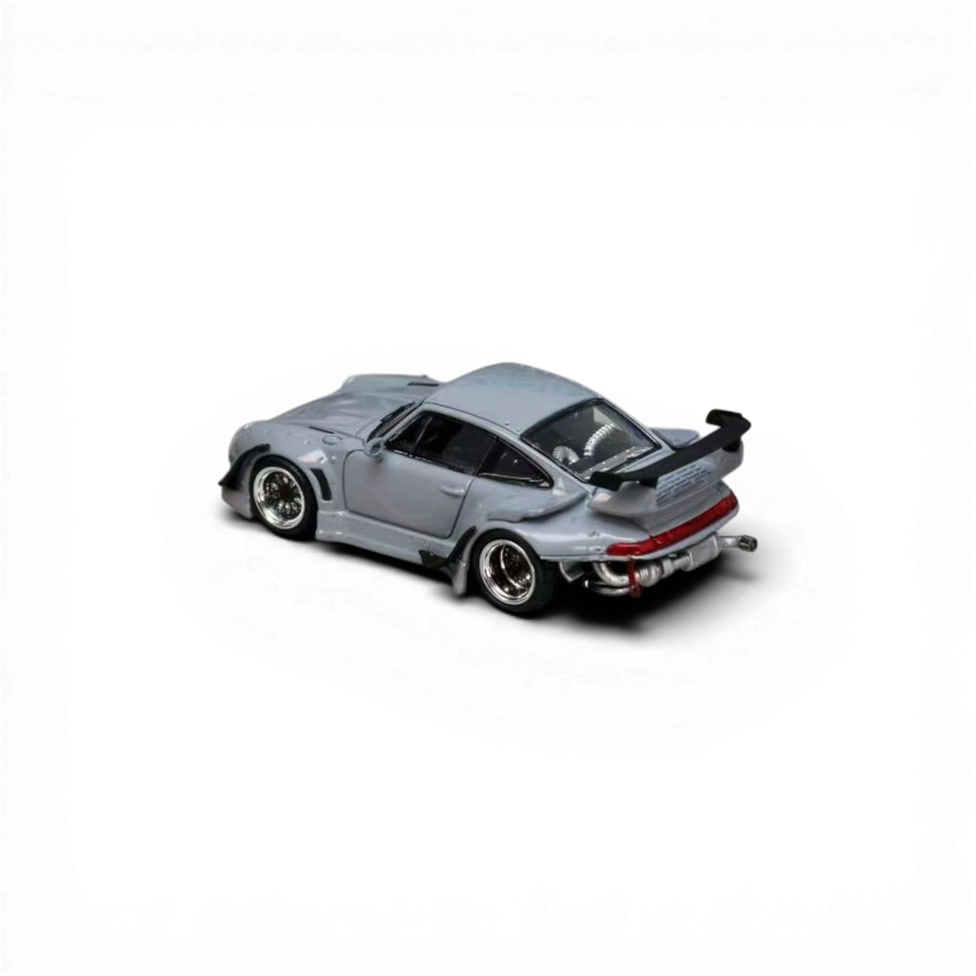 Lot57Supplies Diecast Shop Street Weapon RWB 993 cement grey diecast model car with low tail spoiler and chrome rims.