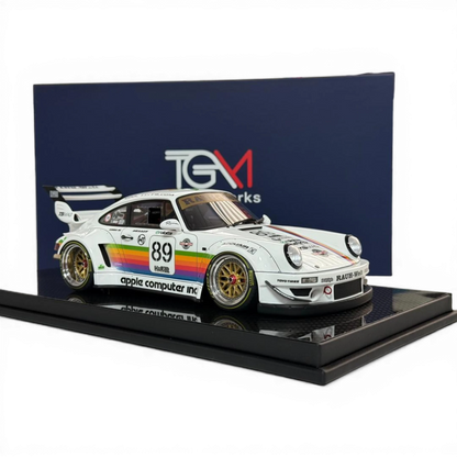 Lot57Supplies Diecast Shop 1:18 scale TGM Porsche RWB 964 model car in white with Apple Computer livery, rainbow stripe, #89, and gold BBS wheels.