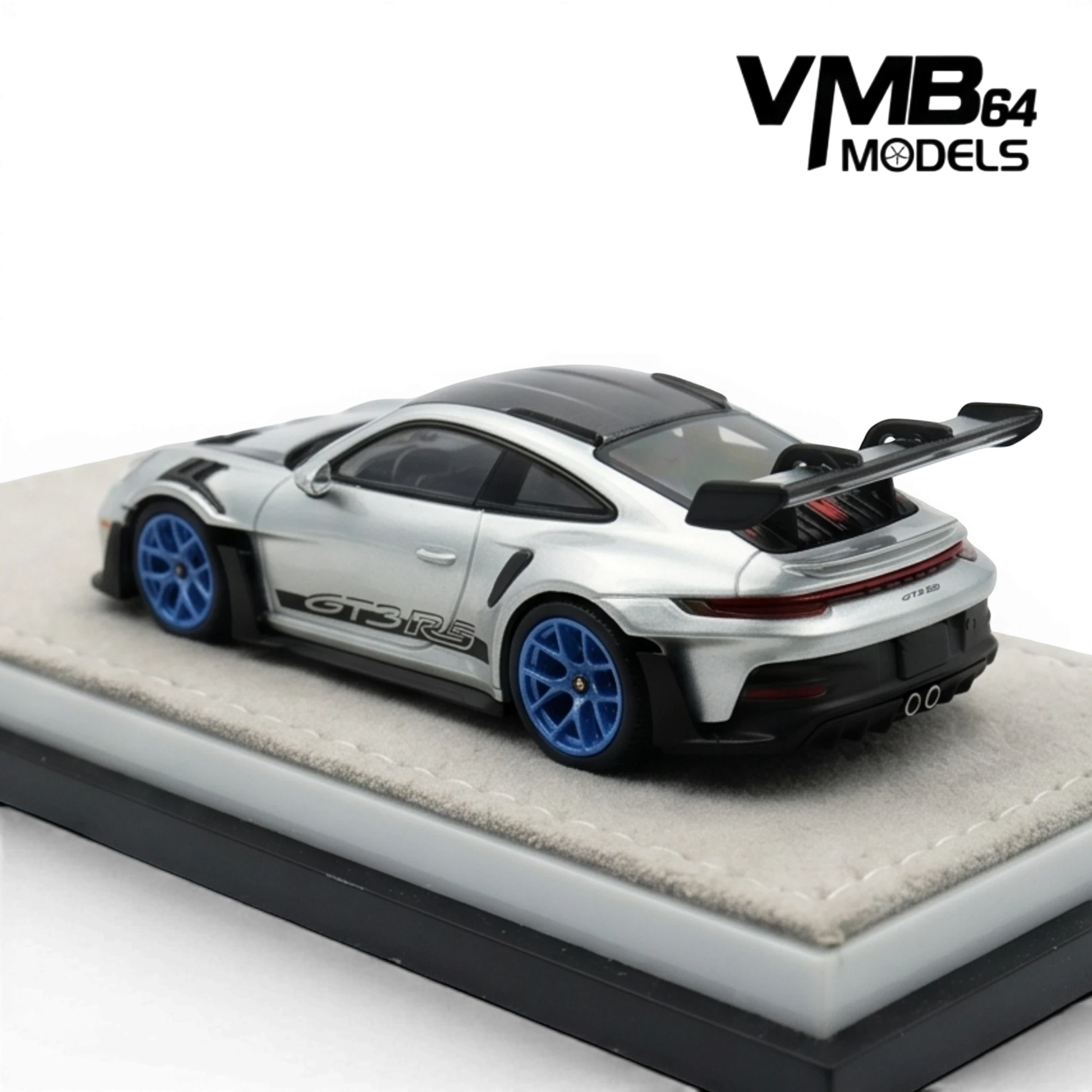 Lot57Supplies Diecast Shop VMB 992 GT3 RS 1:64 scale model in metallic silver with blue wheels and a large rear spoiler.