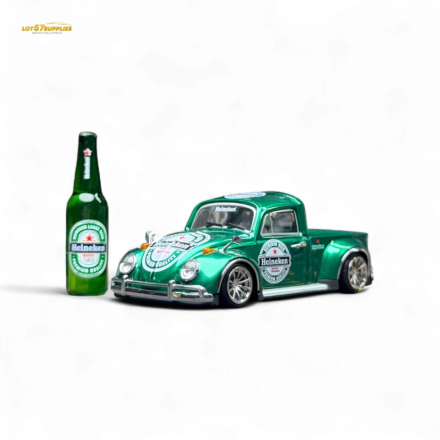 Green model truck and bottle with Heineken logo on a white background