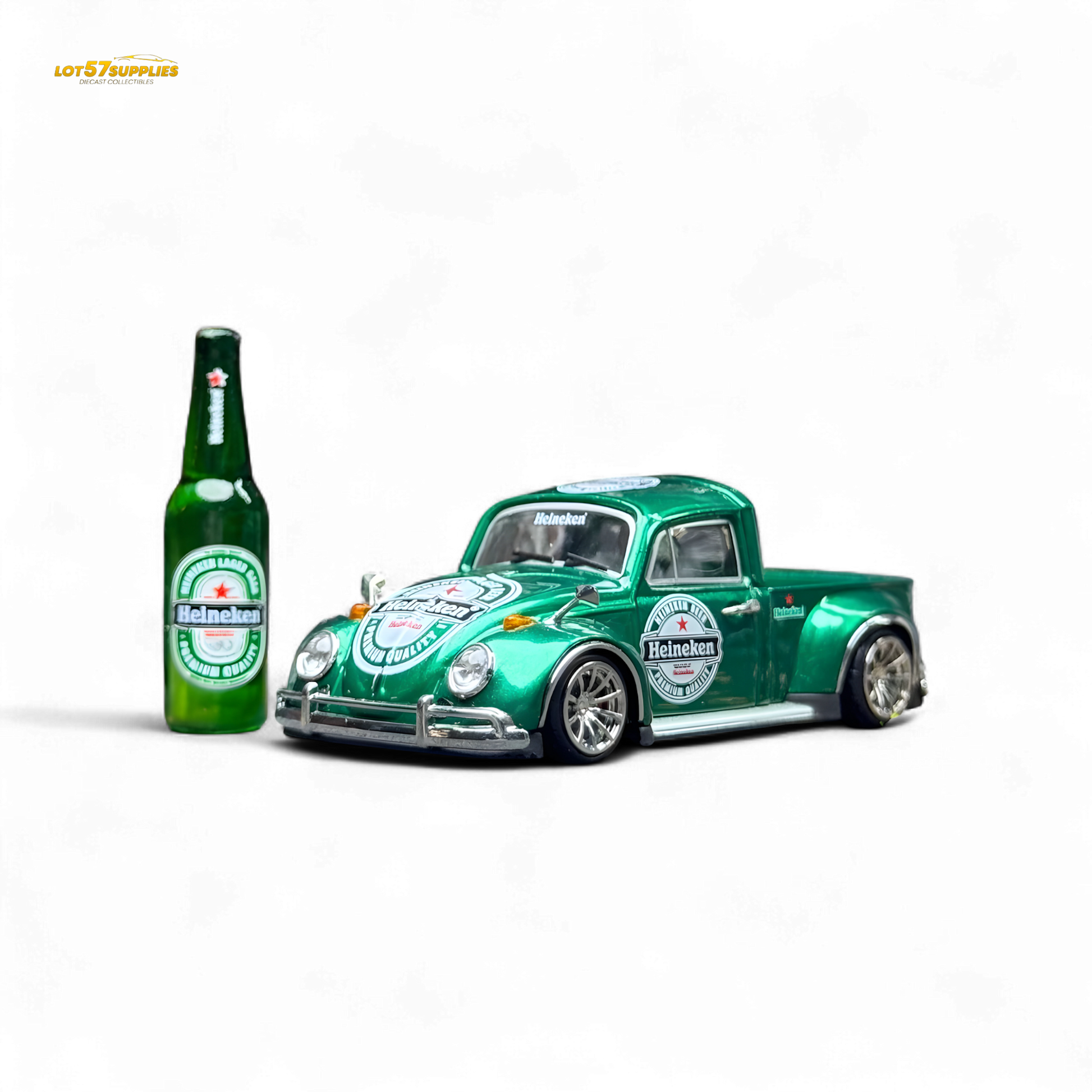 Green model truck and bottle with Heineken logo on a white background