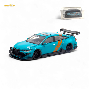 Turquoise model car with orange stripes on a white background