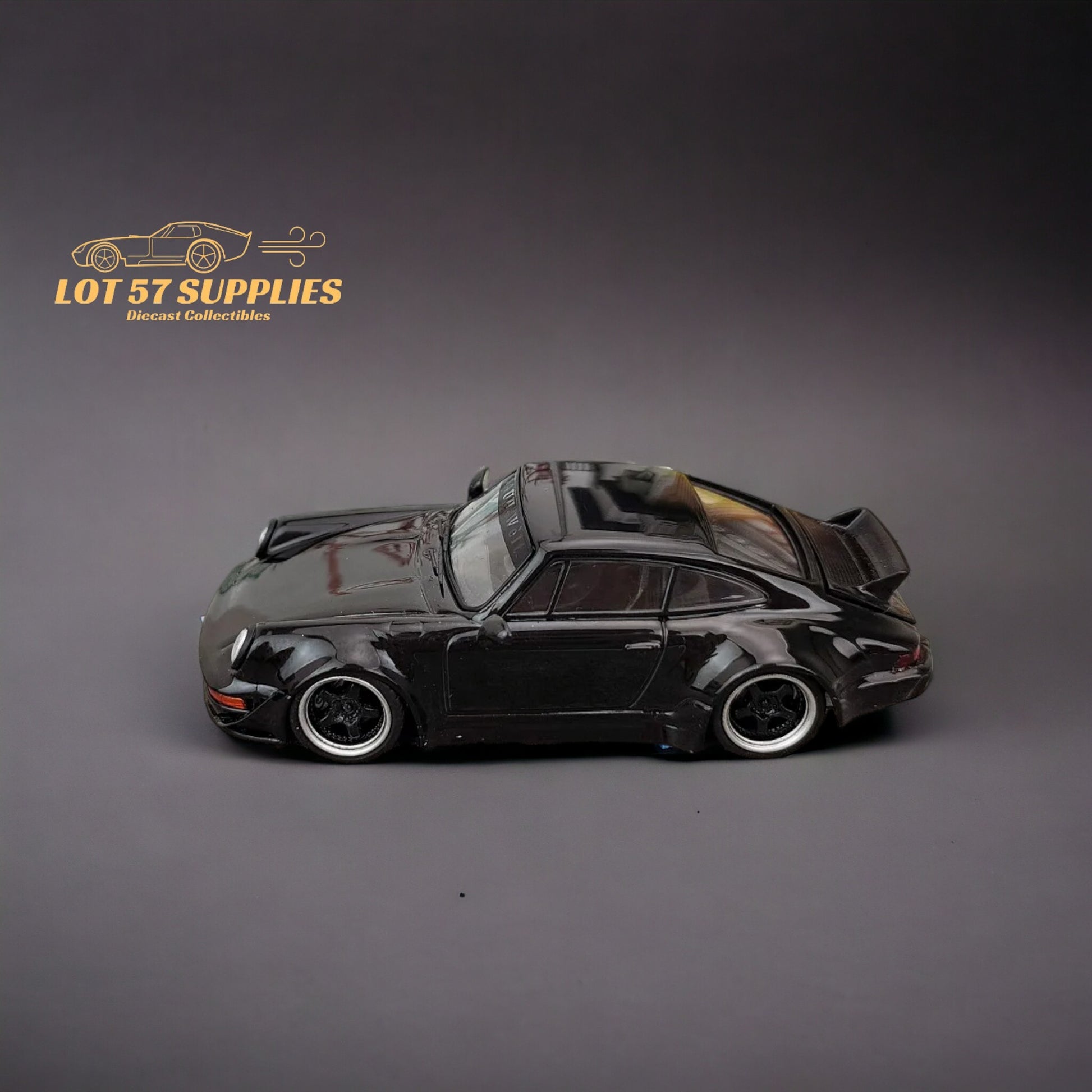 Flame Porsche 964 RWB Ducktail in Gloss Black 1:64