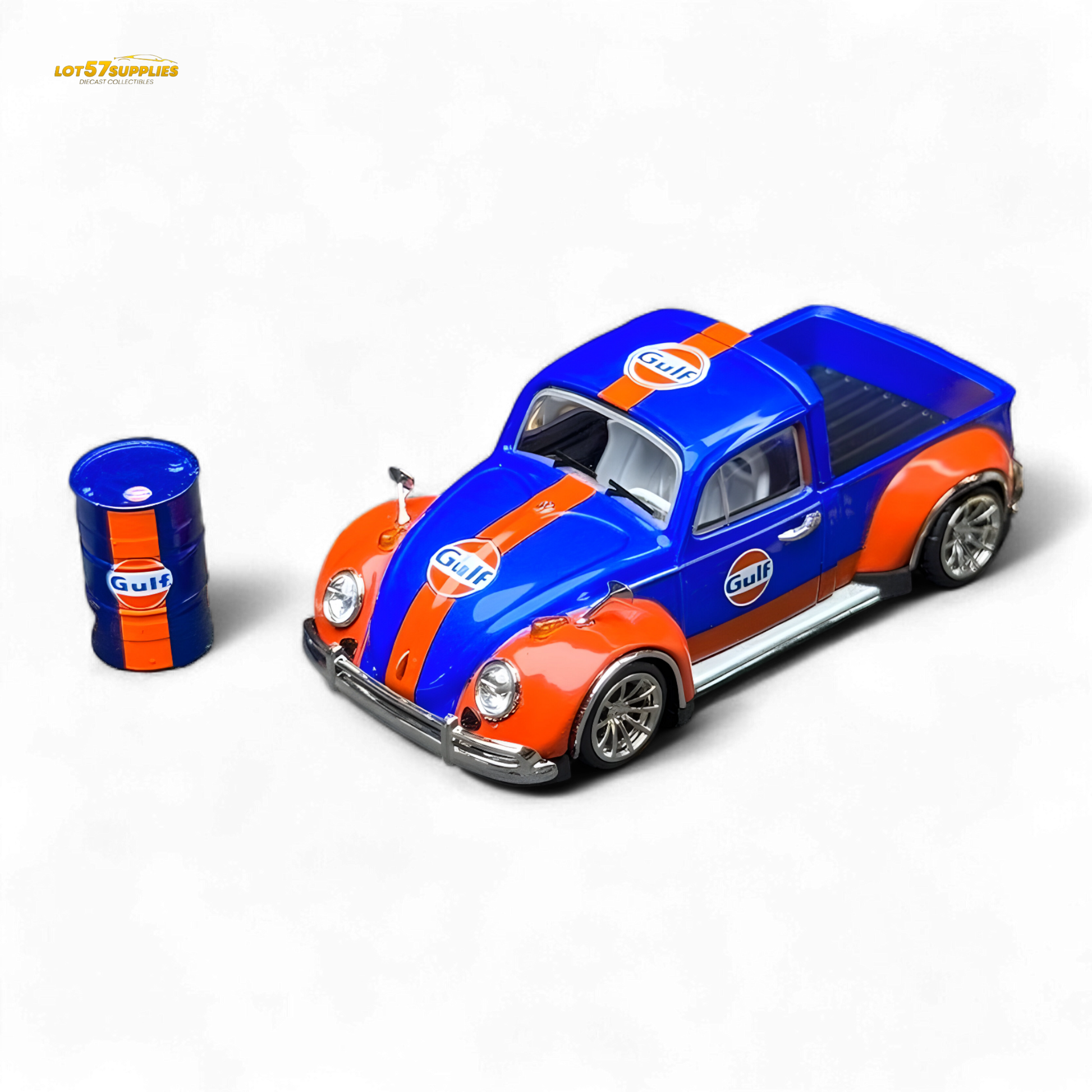 Model car with Gulf livery next to a small oil drum on a white background
