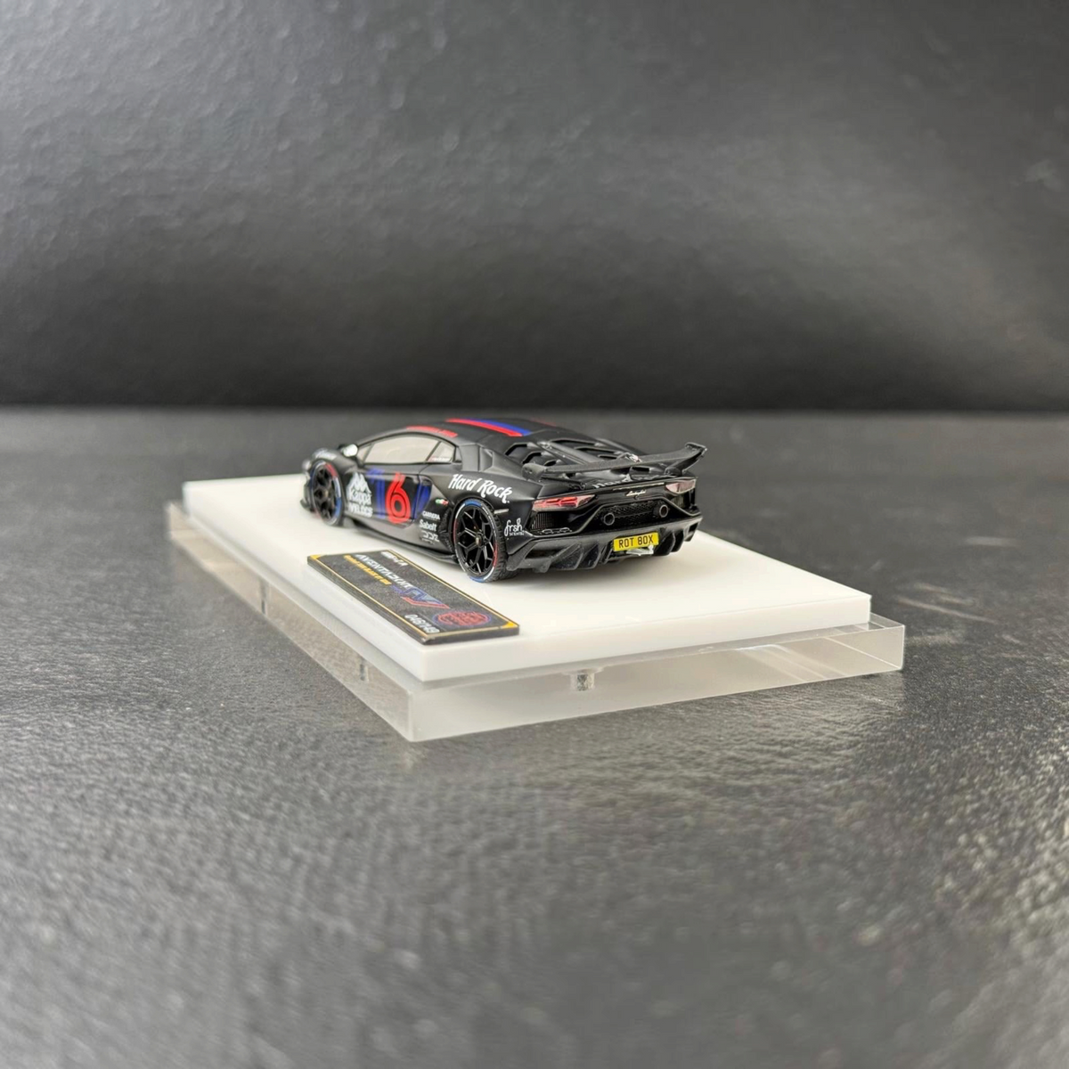 TARDIS Gumball3000 Lamborghini Aventador SVJ Matte Black Resin 1:64 diecast model, rear three-quarter on white base