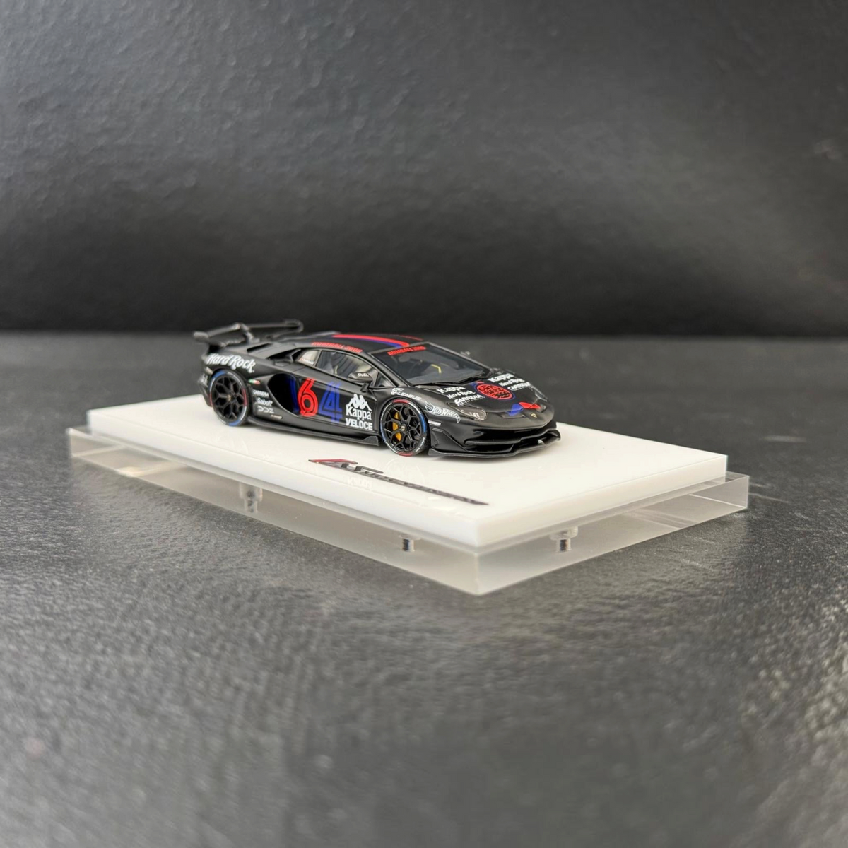 TARDIS Gumball3000 Lamborghini Aventador SVJ Matte Black Resin 1:64 diecast model, front three-quarter on display base