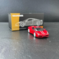 TOC x EDM x AHandofGod Ferrari 458 Rosso Corsa + White Stripe 1:64 diecast front three-quarter view with box behind